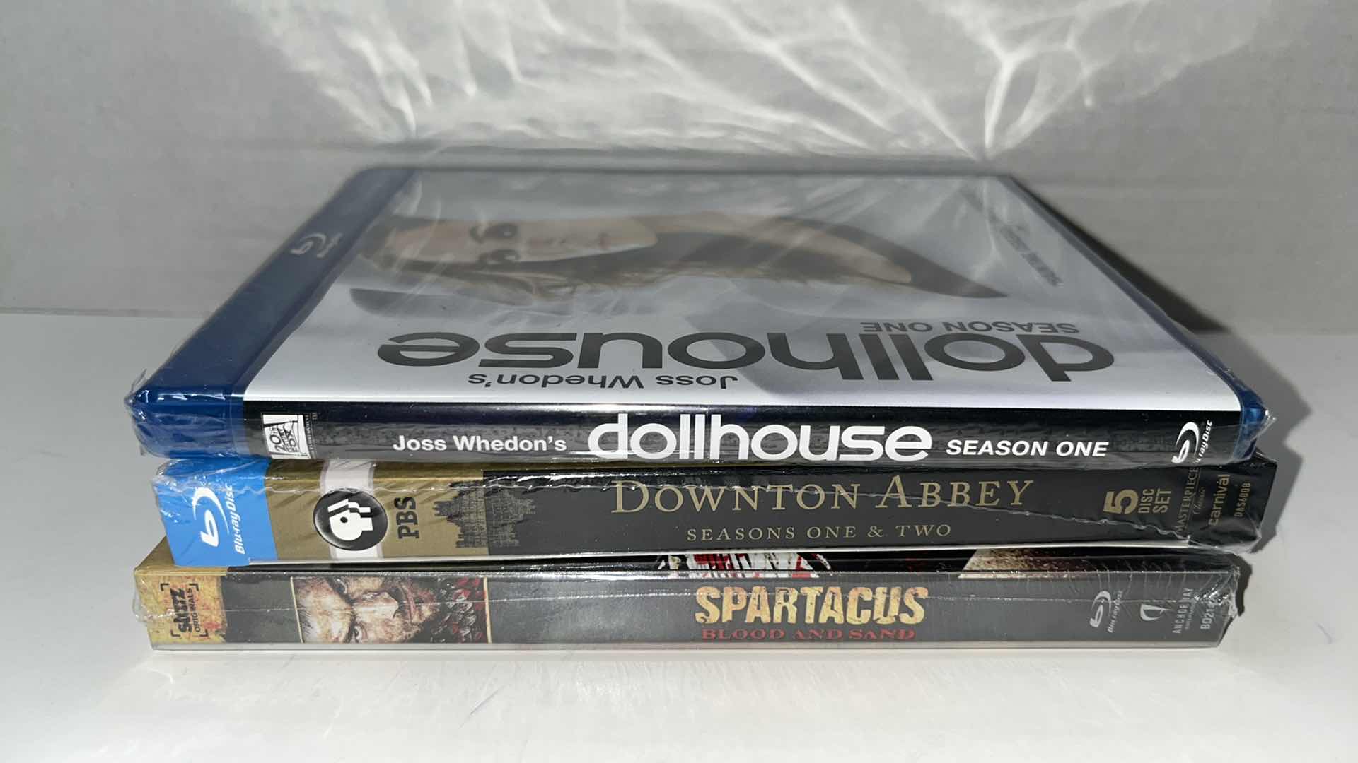 Photo 1 of NEW DOLLHOUSE SEASON ONE, DOWNTON ABBEY SEASONS 1 & 2, SPARTACUS BLOOD AND SAND BLU-RAY MOVIES (3)