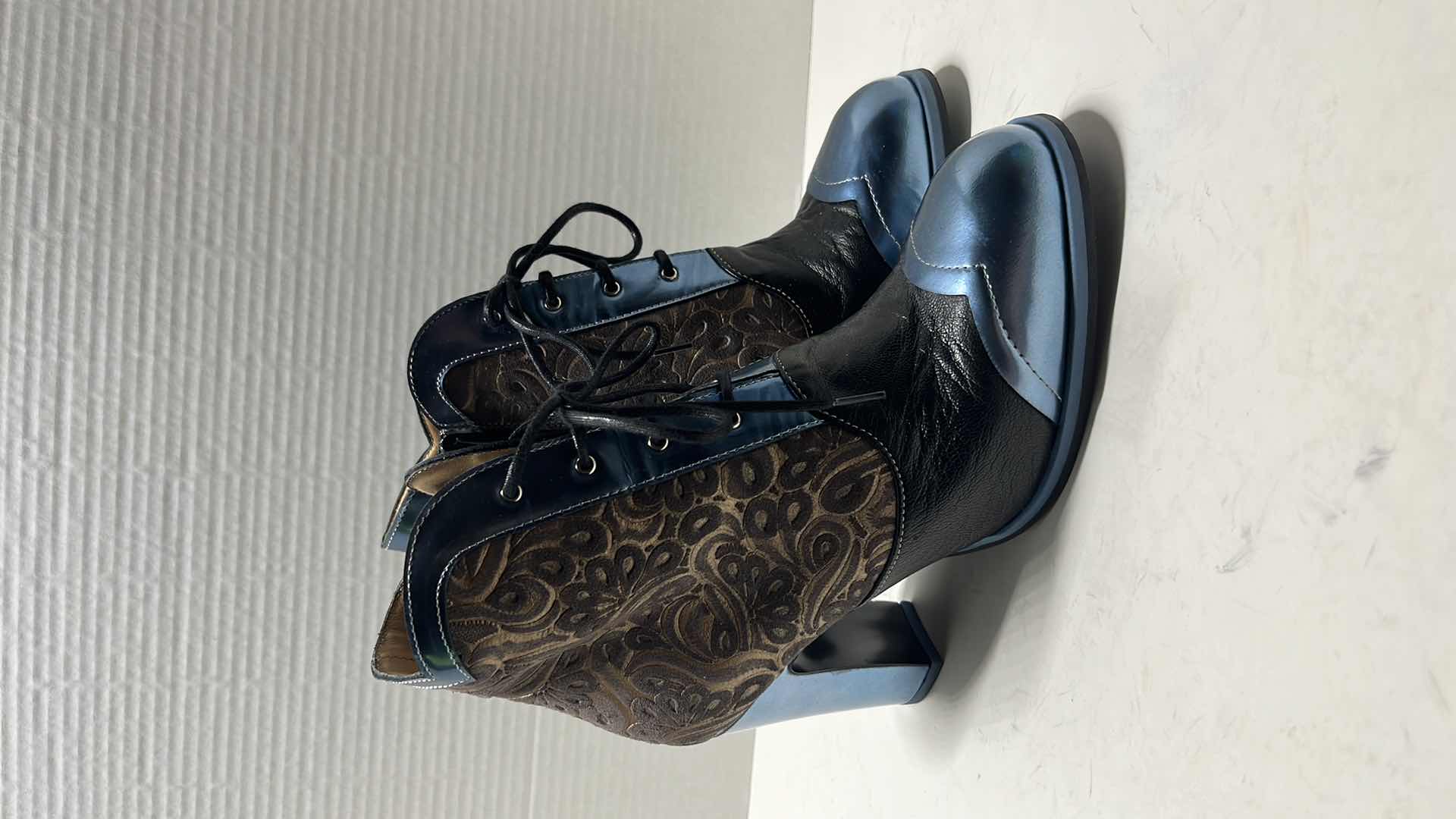Photo 1 of JOHN FLUEVOG CARMEN EMBOSSED BOOT W STORAGE BAG, METALLIC BLUE/GOLD/BLACK (WOMENS SIZE 8.5)