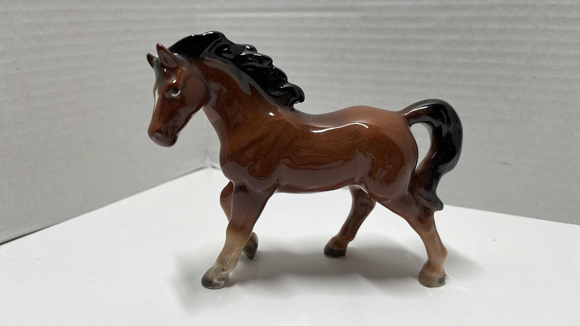 Photo 1 of CERAMIC HORSE FIGURINES (8)