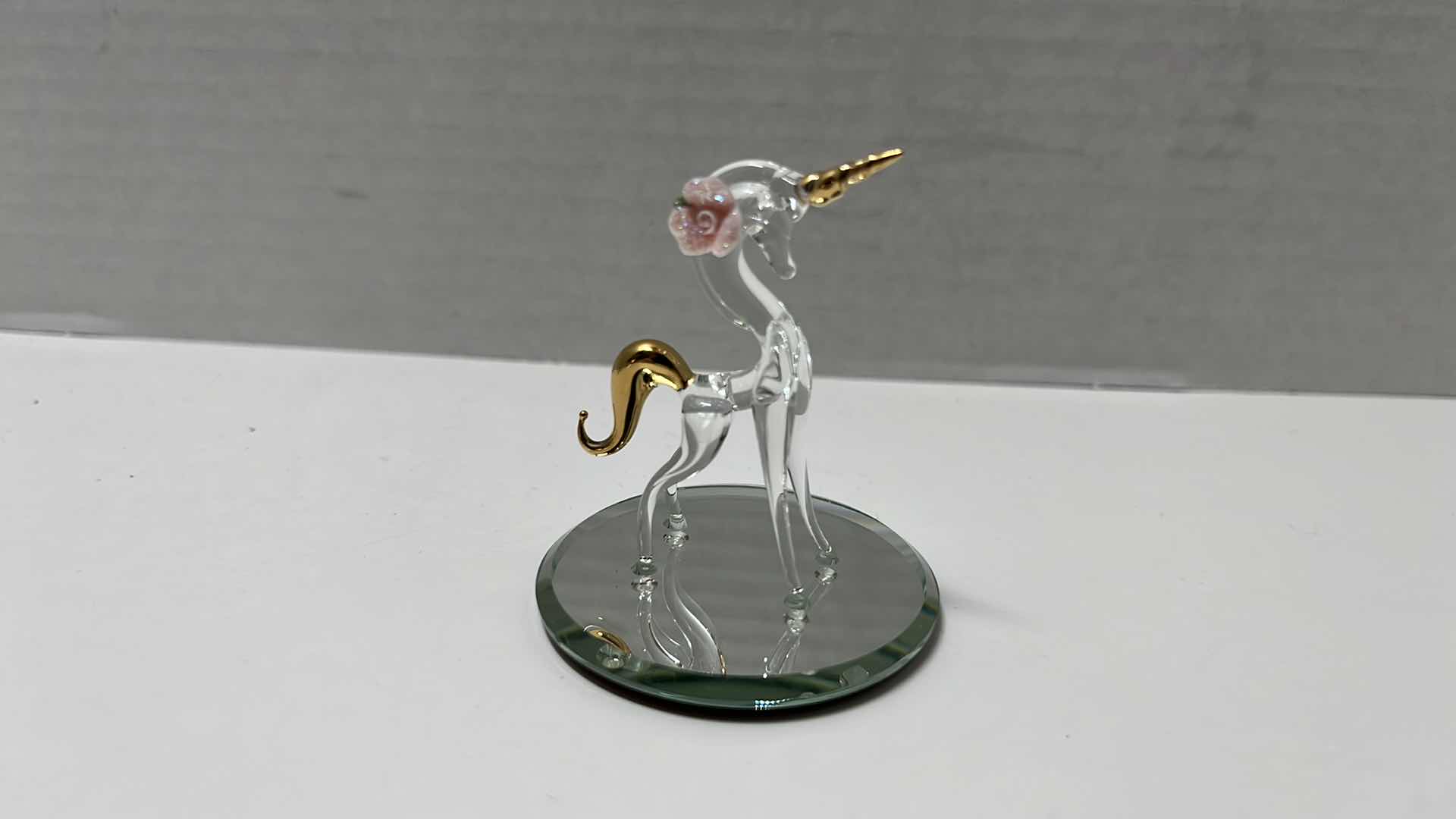 Photo 1 of HAND BLOWN CLEAR BLUE GLASS UNICORNS W GOLD ACCENTS & MIRRORED HAND BLOWN UNICORNS (5)