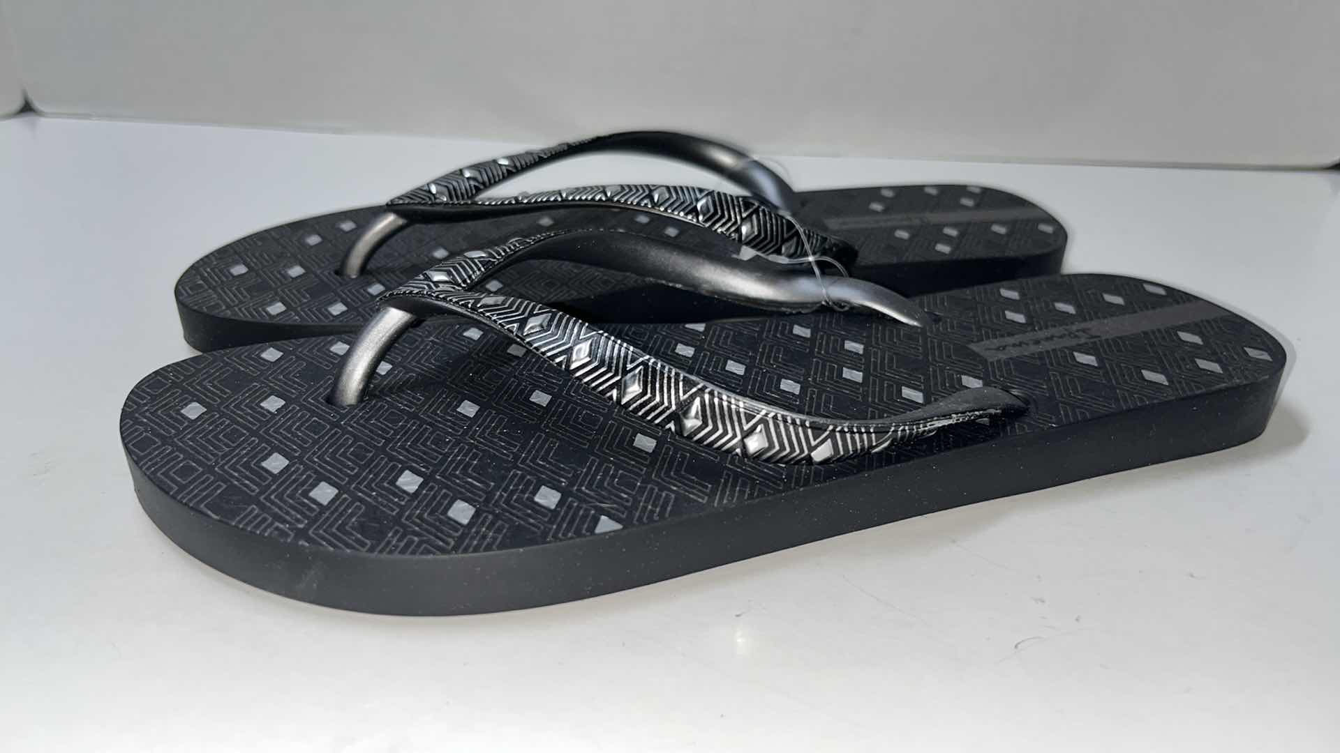 Photo 1 of NEW IPANEMA TRENDS VIII FLIP FLOPS, BLACK/SILVER (WOMENS SIZE 9)