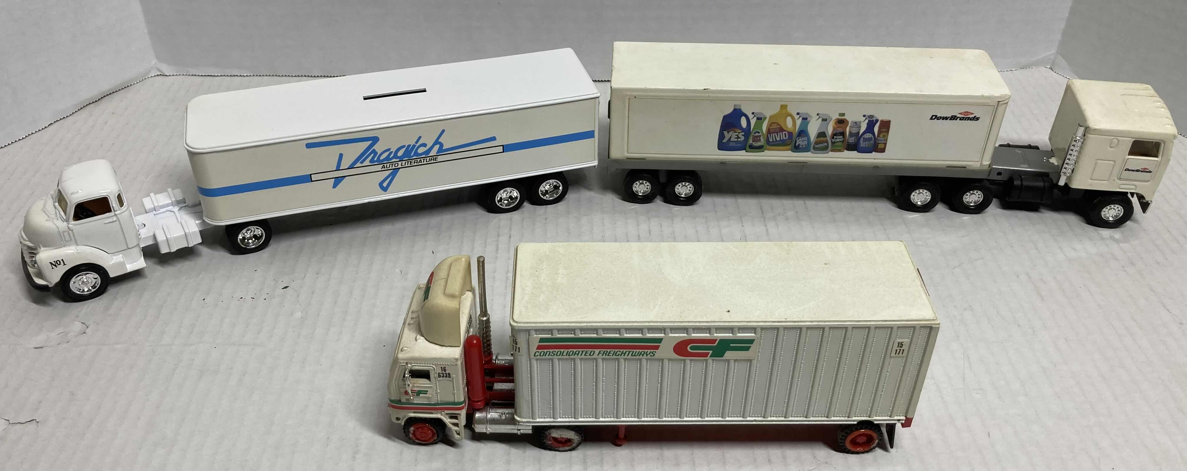 Photo 1 of ERTL AUTO LITERATURE & DOW BRANDS SEMI-TRUCKS W 
TONKIN CF CONSOLIDATED FREIGHTWAYS SEMI-TRUCK MODEL TRUCKS