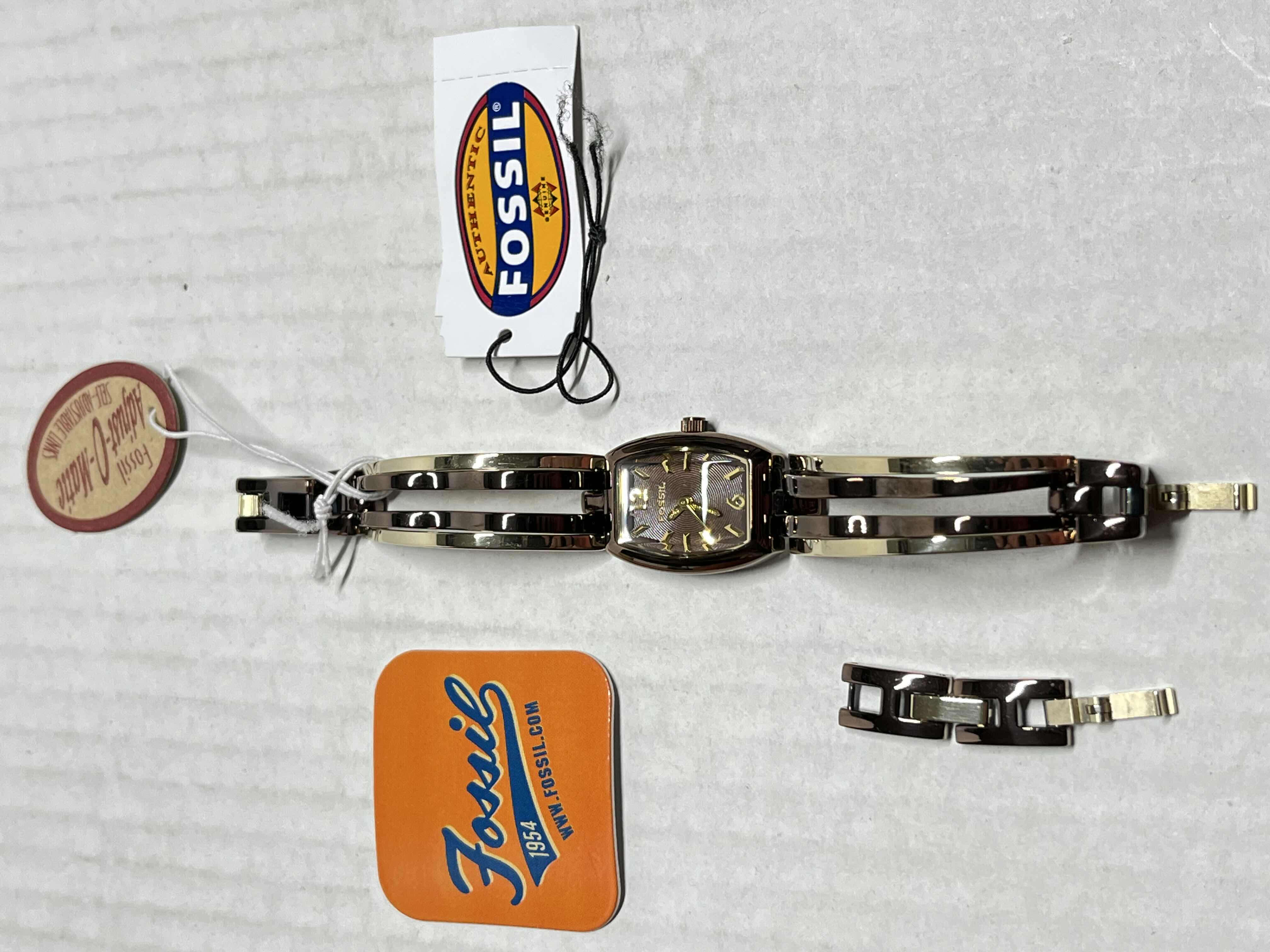 Photo 1 of FOSSIL 2-TONE ALL STAINLESS STEEL WOMENS ANALOG WATCH 50M 165FT ES-1859