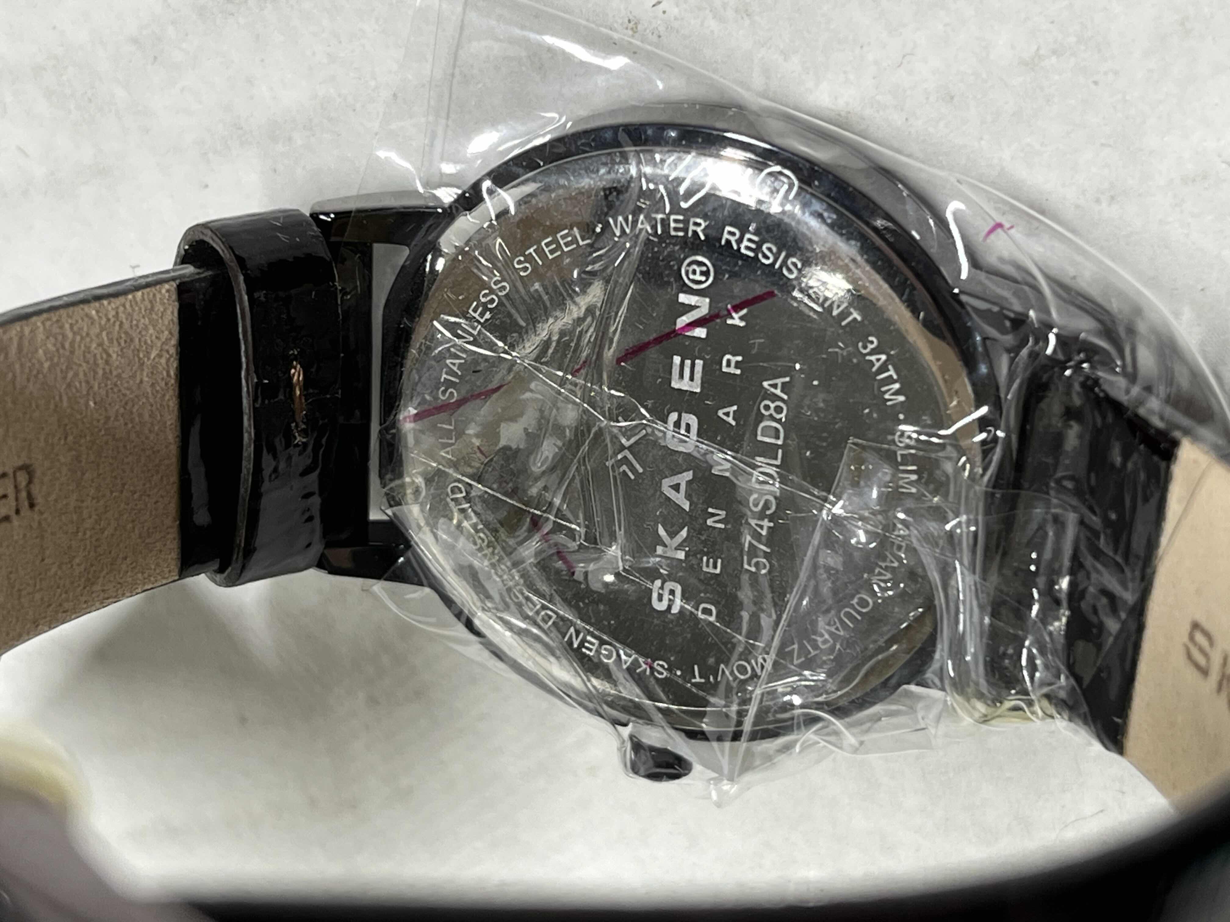 Photo 1 of SKAGEN STEEL WOMENS ANALOG WATCH W STAINLESS STEEL CASE & GENUINE LEATHER STRAP PURPLE MOTHER OF PEARL INLAY W SWAROVSKI CRYSTALS MODEL 574SDLD8A