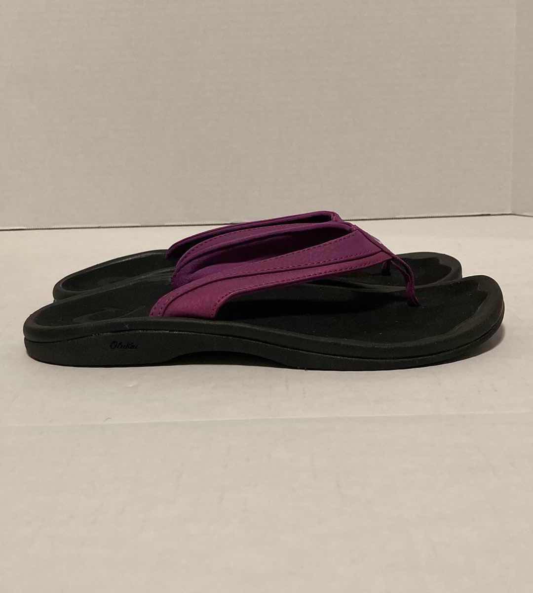 Photo 1 of OLUKAI OHANA ORCHID FLOWER & BLACK WATER RESISTANT SANDALS WOMEN’S SIZE 9