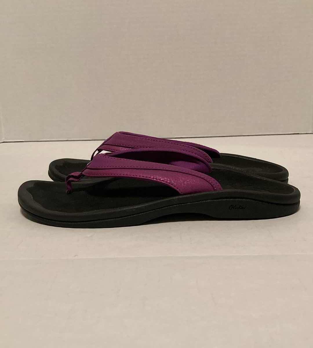 Photo 1 of OLUKAI OHANA ORCHID FLOWER & BLACK WATER RESISTANT SANDALS WOMEN’S SIZE 9
