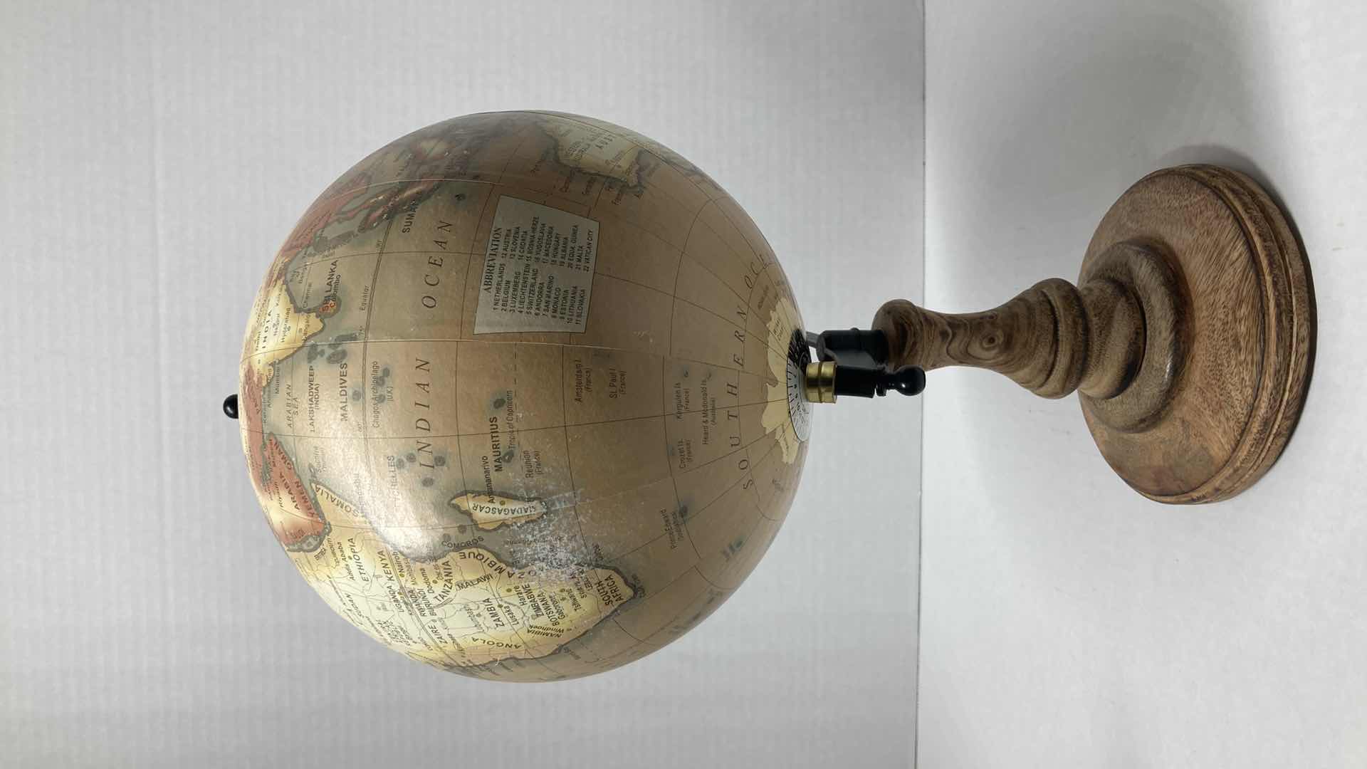 Photo 1 of HOME ESSENTIALS & BEYOND WOODEN BASE GLOBE 8.75” X 16”