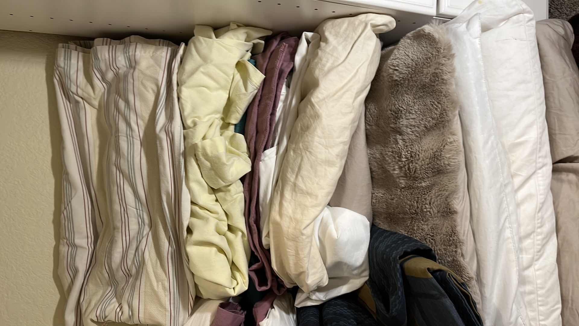 Photo 5 of CONTENTS OF CLOSET- LINENS, PILLOWS,THROW BLANKETS, BED SPREAD