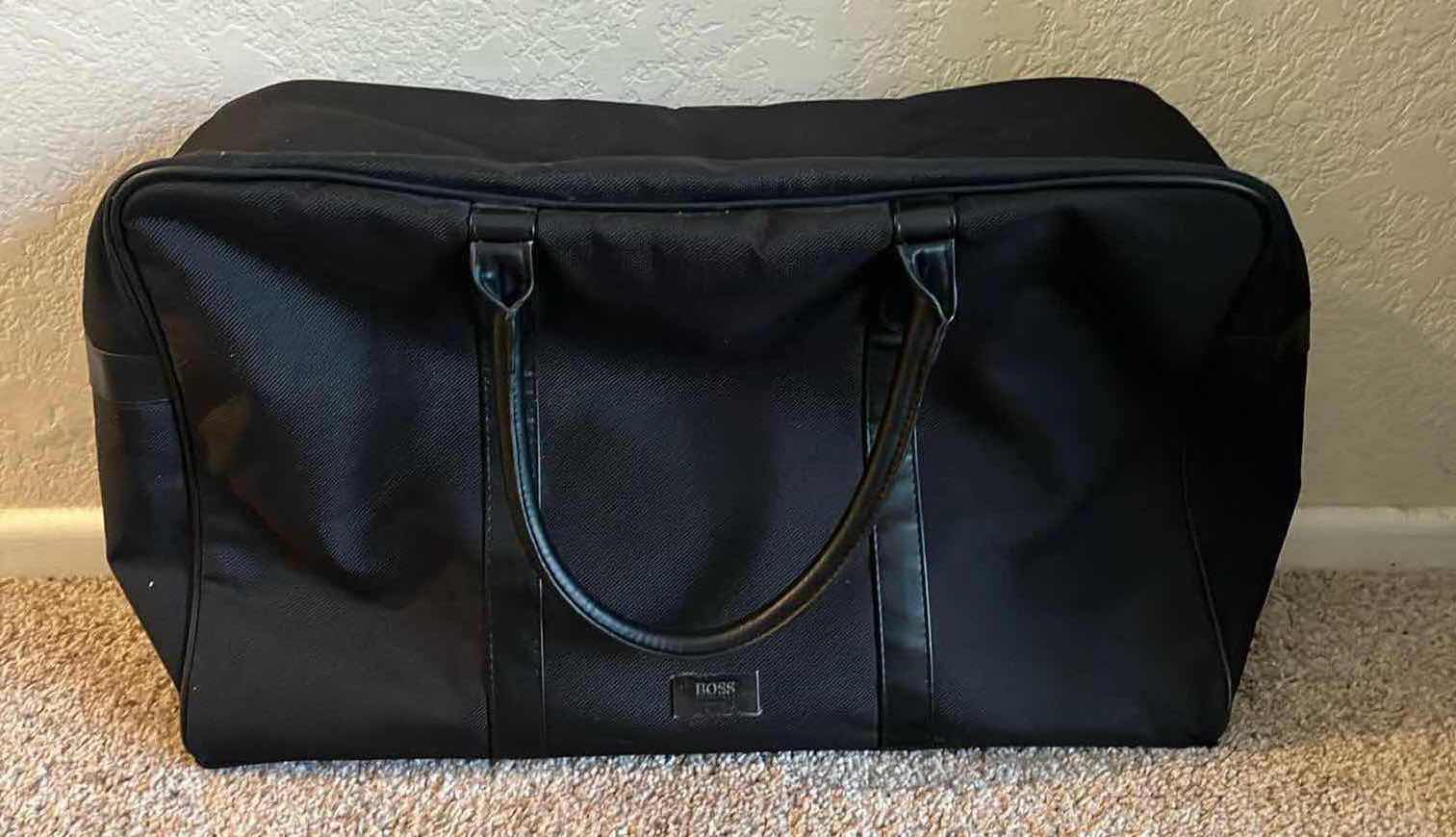 Photo 1 of RICARDO ROLLING LUGGAGE CHECK BAG W BOSS TRAVEL CARRYON BAG