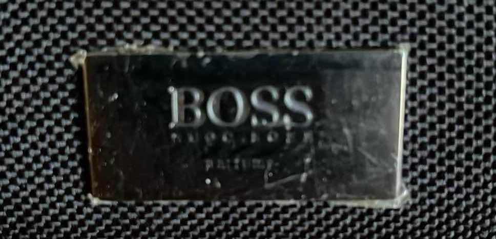 Photo 1 of RICARDO ROLLING LUGGAGE CHECK BAG W BOSS TRAVEL CARRYON BAG