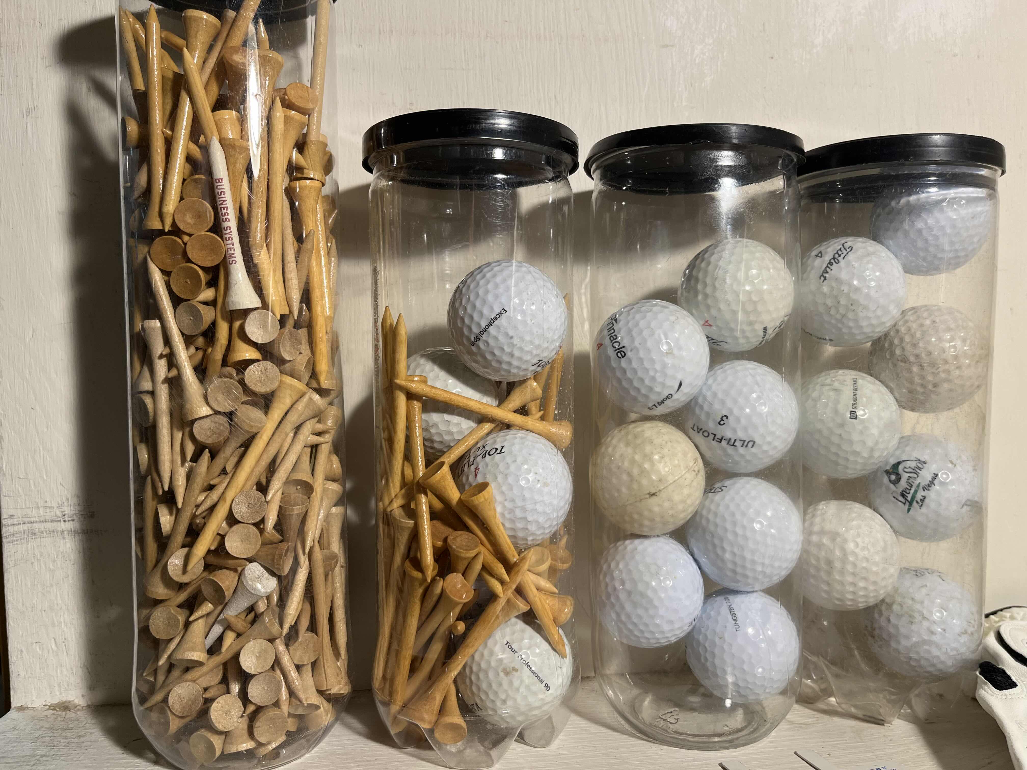 Photo 1 of GOLF ACCESSORIES-WOOD TEES, GOLF BALLS, COUNTER, GAUGES & GLOVES
