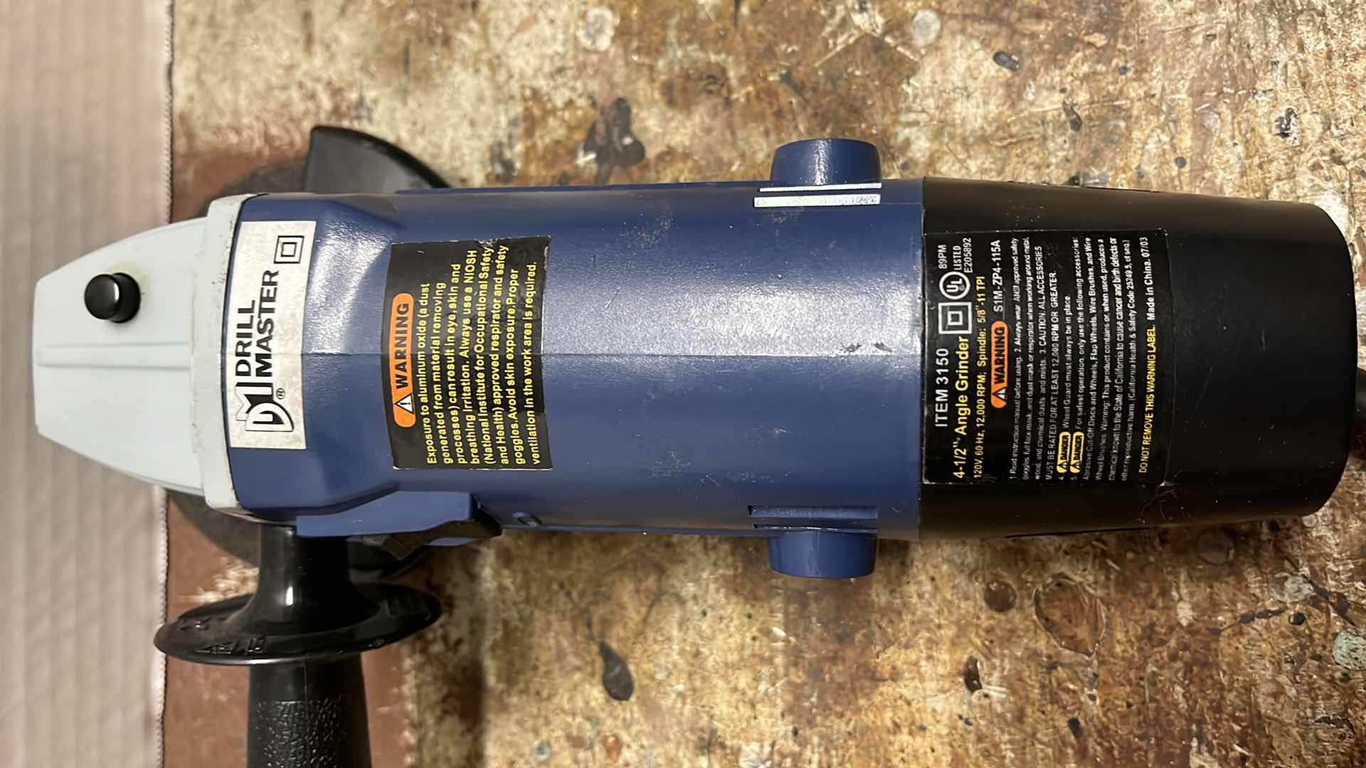 Photo 1 of DRILL MASTER 4-1/2 ANGLE GRINDER MODEL 03150 W NEW GRINDING WHEELS