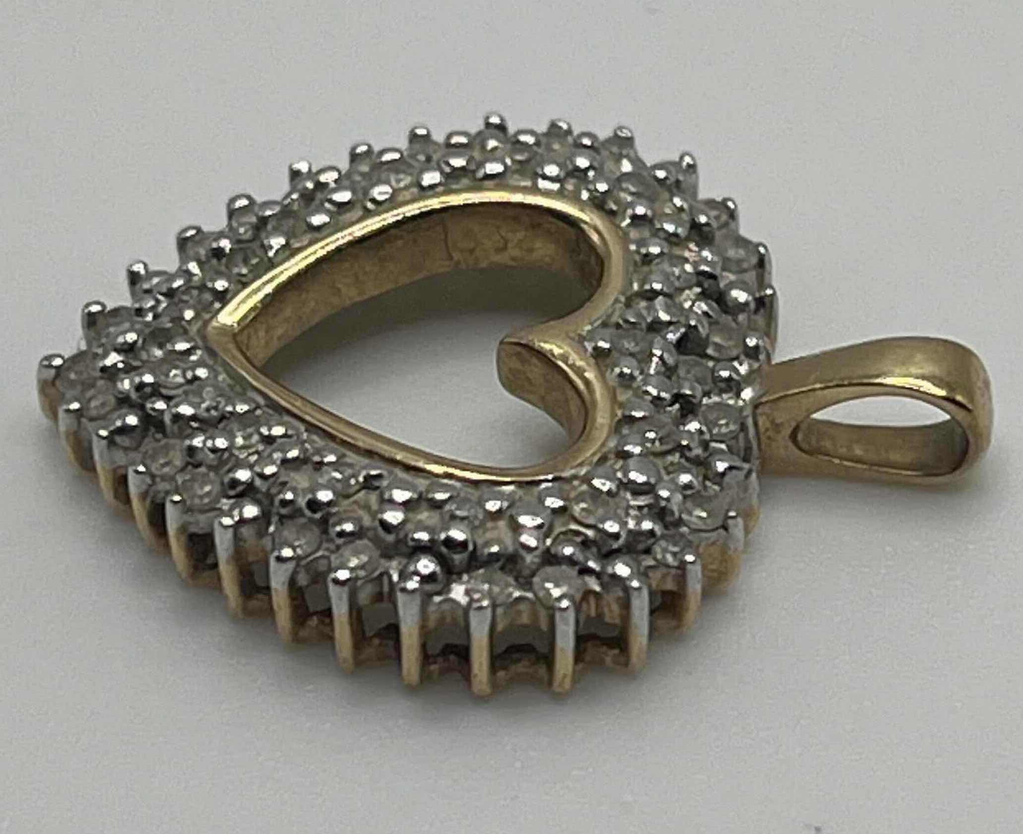 Photo 1 of DIAMOND CLUSTER GOLD 10K HEART PENDANT 3GRAMS