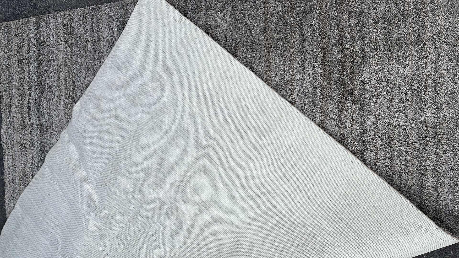 Photo 1 of MULTI-COLORED EARTH TONE SHAG AREA RUG 91” X 106”