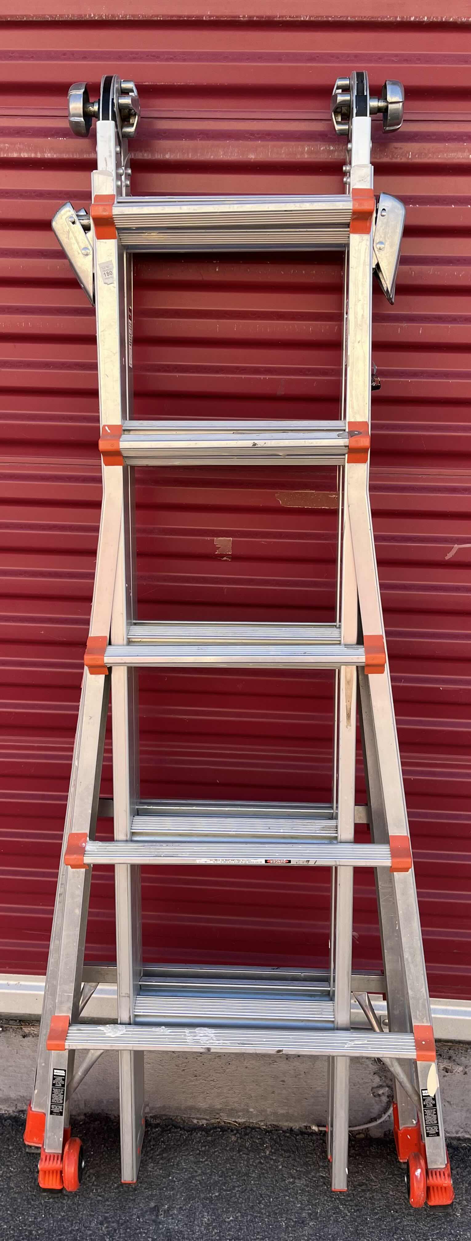 Photo 1 of LITTLE GIANT LADDER SYSTEM REVOLUTION OSHA HEAVY DUTY RATED MULTI-POSITION EXTENSION STEP LADDER MODEL 22
