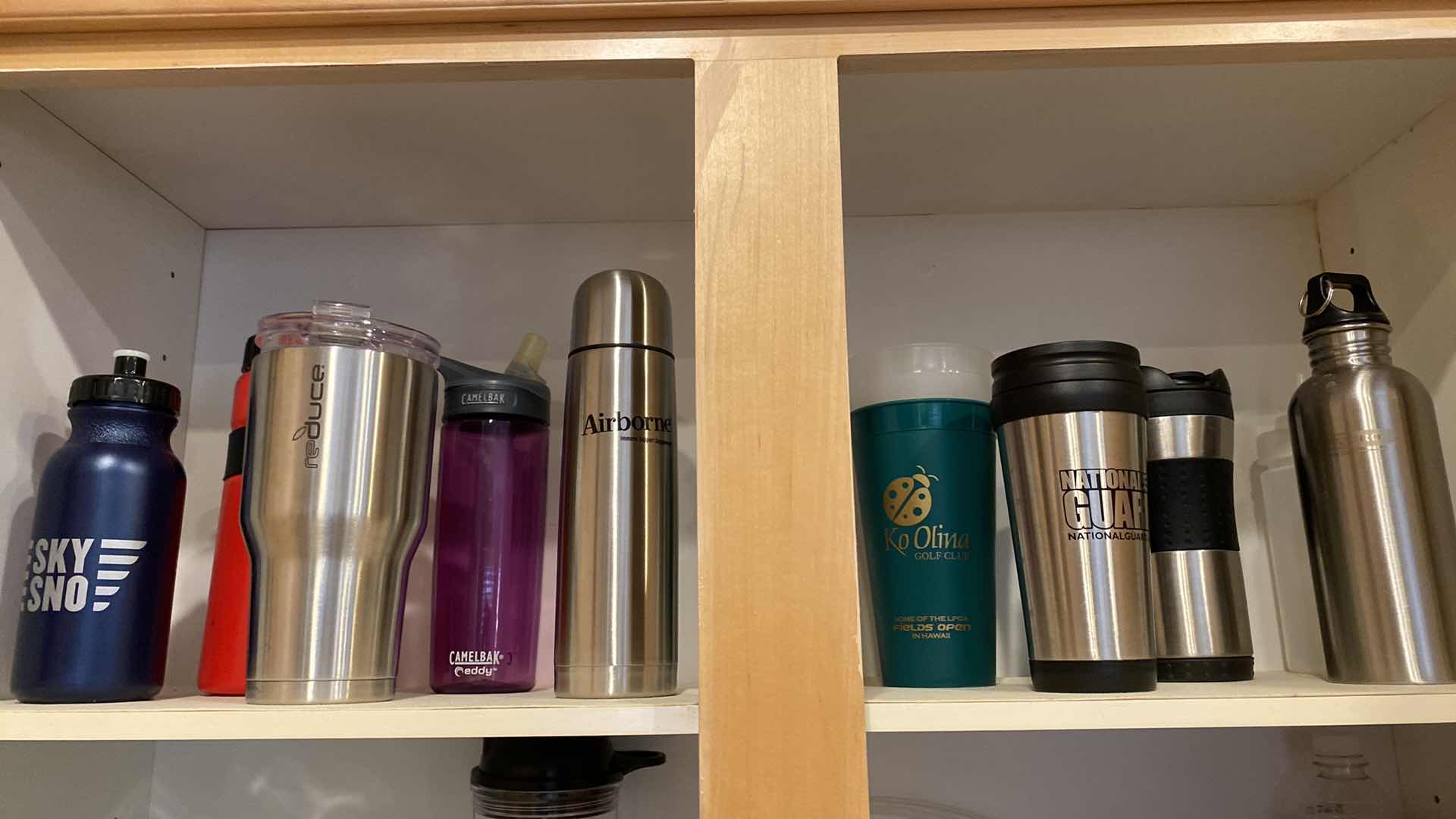 Photo 1 of CONTENTS OF SHELF VARIOUS SIZES BEVERAGE BOTTLES AND CUPS