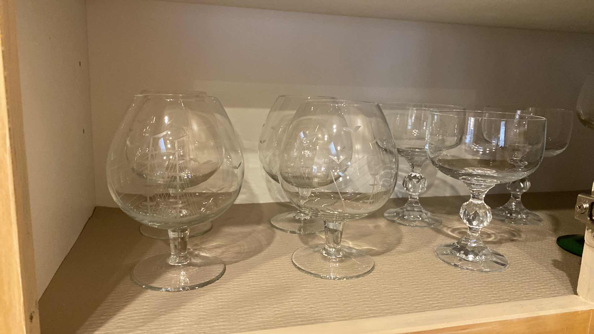 Photo 1 of CONTENTS OF CABINET STEMWARE