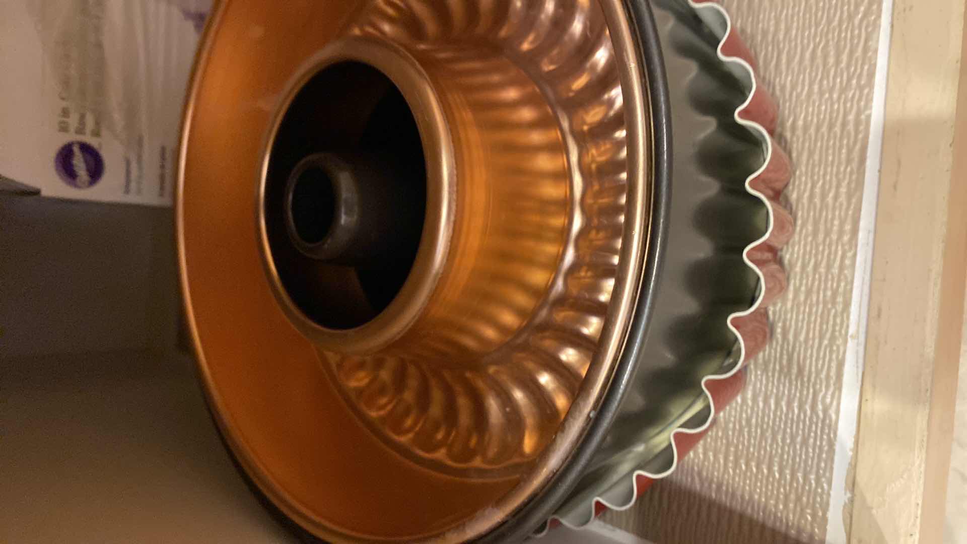 Photo 1 of CONTENTS OF CABINET KNIVES, MOLD, PLATER AND BAKEWARE