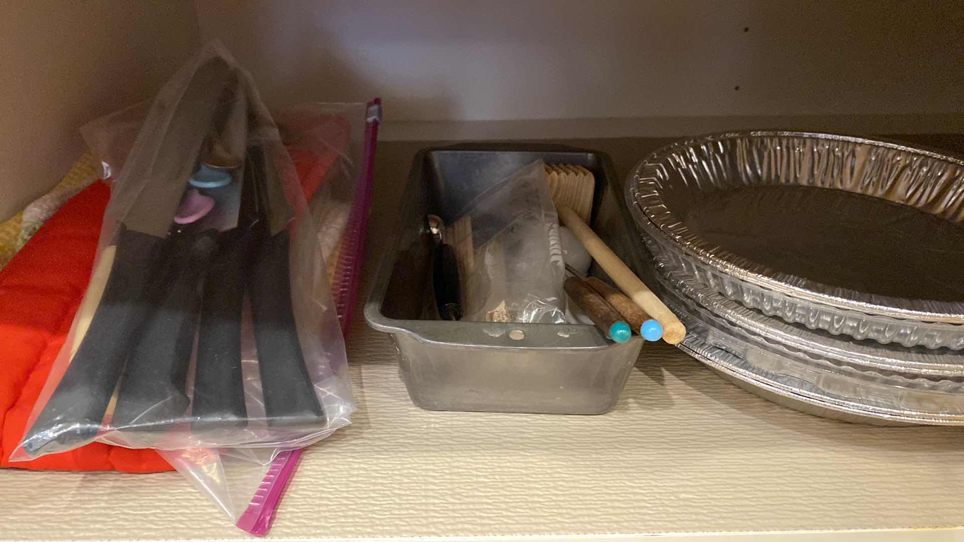 Photo 1 of CONTENTS OF CABINET KNIVES, MOLD, PLATER AND BAKEWARE