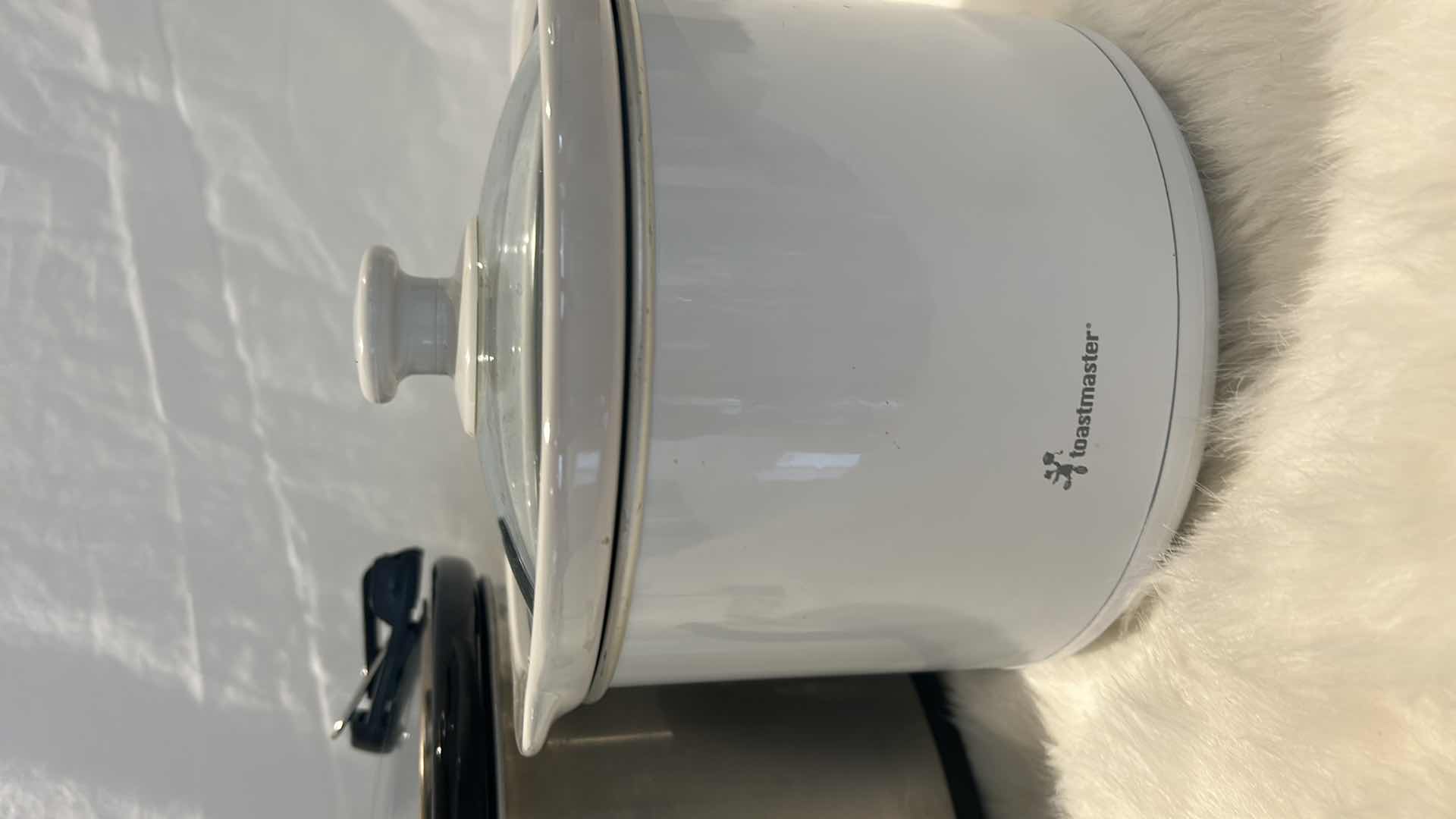 Photo 1 of KITCHEN ACCESSORIES- 2 SLOW COOKERS AND 1 GLASS STORAGE CONTAINER