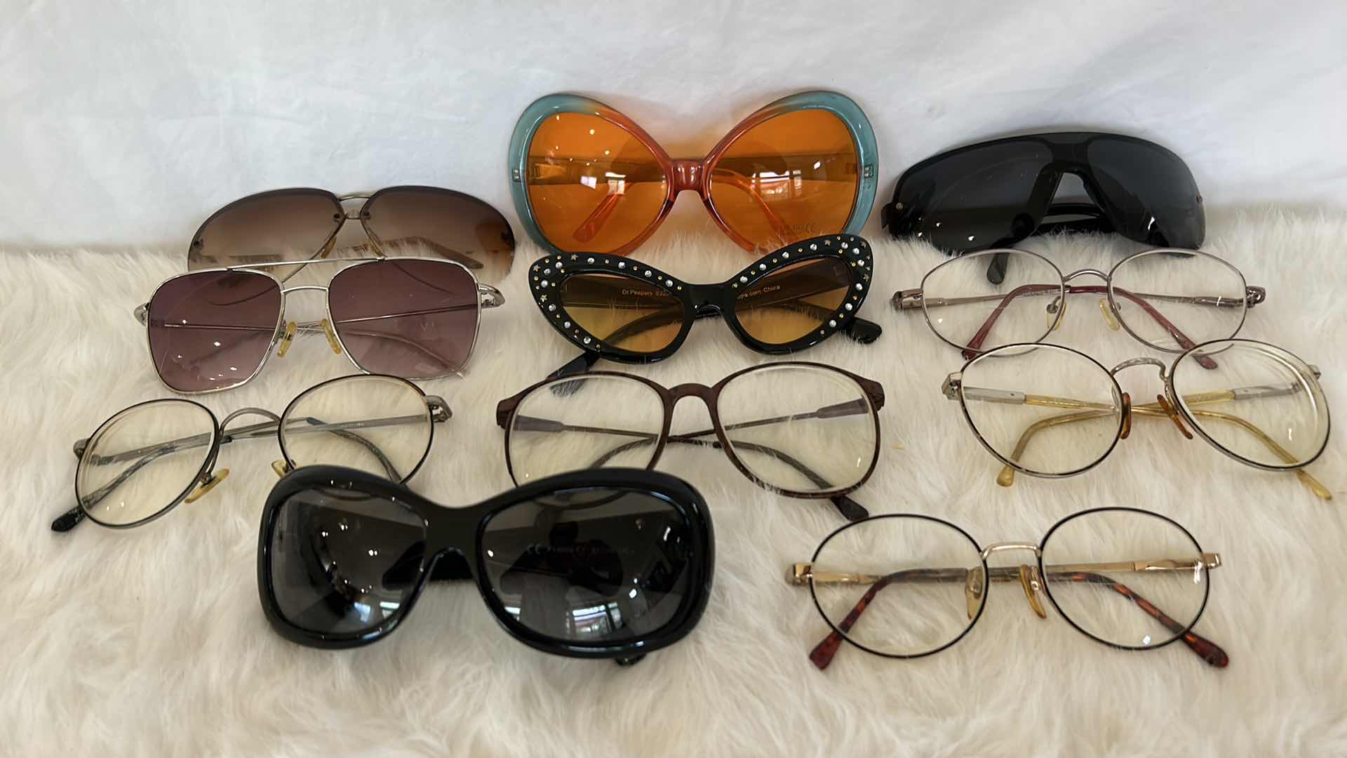 Photo 1 of EYEGLASS AND SUNGLASS ASSORTMENT