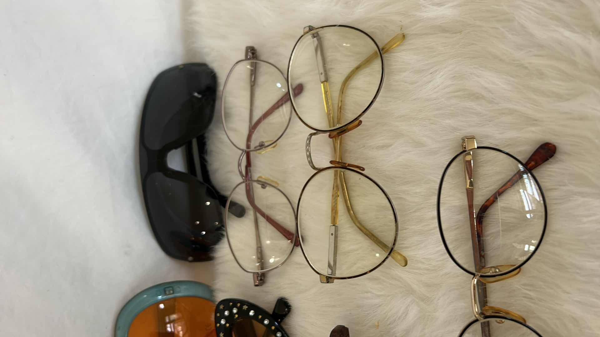 Photo 1 of EYEGLASS AND SUNGLASS ASSORTMENT