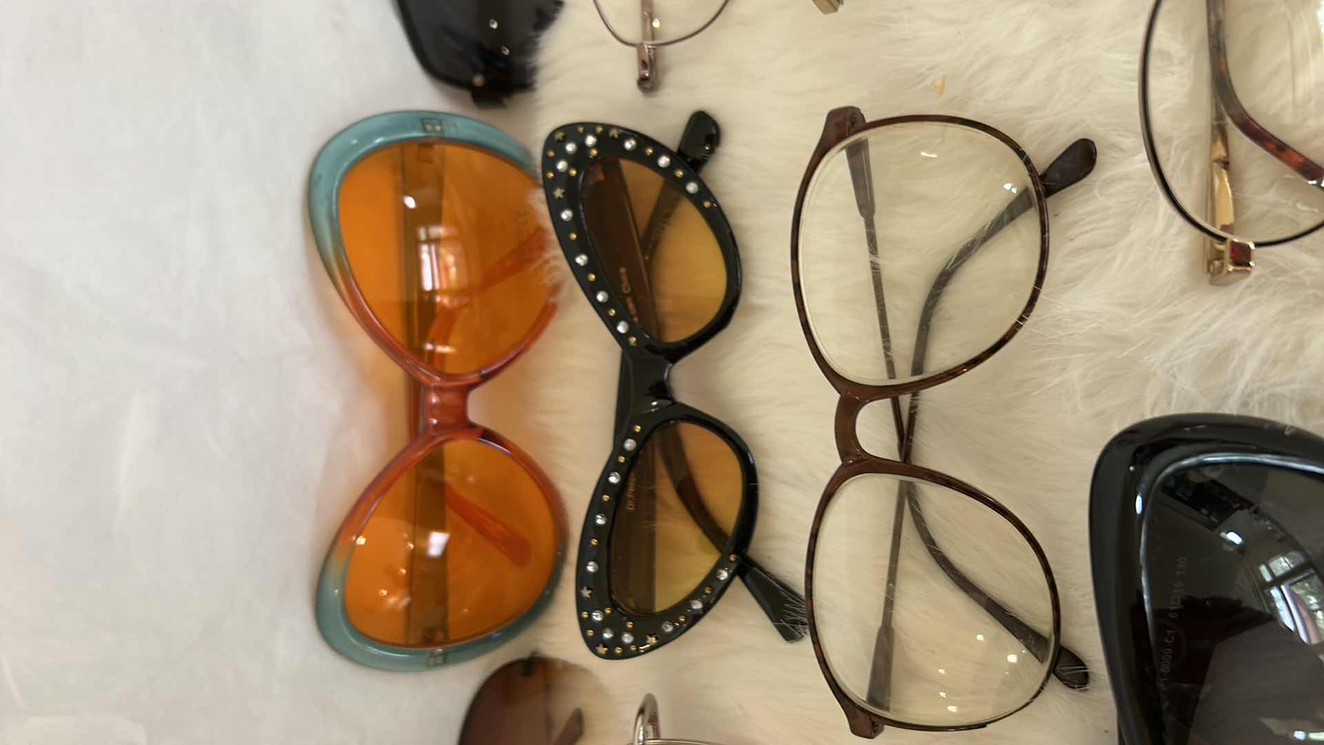 Photo 1 of EYEGLASS AND SUNGLASS ASSORTMENT