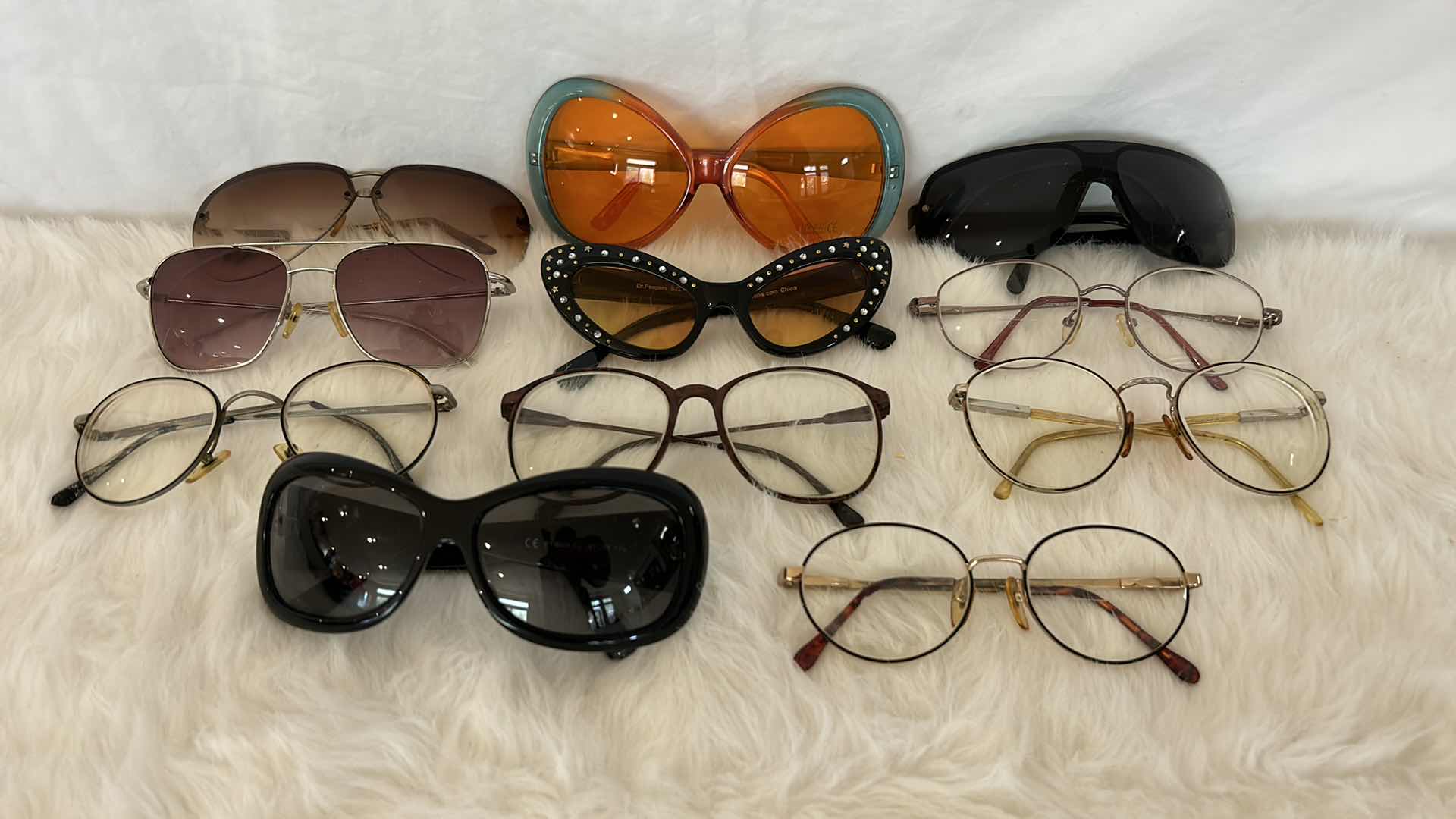 Photo 1 of EYEGLASS AND SUNGLASS ASSORTMENT