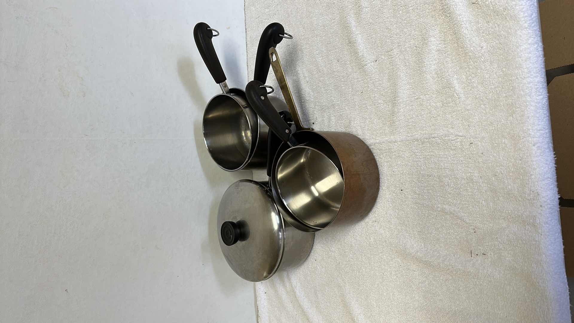 Photo 1 of BOX OF ASSORTED SMALL POTS AND PANS