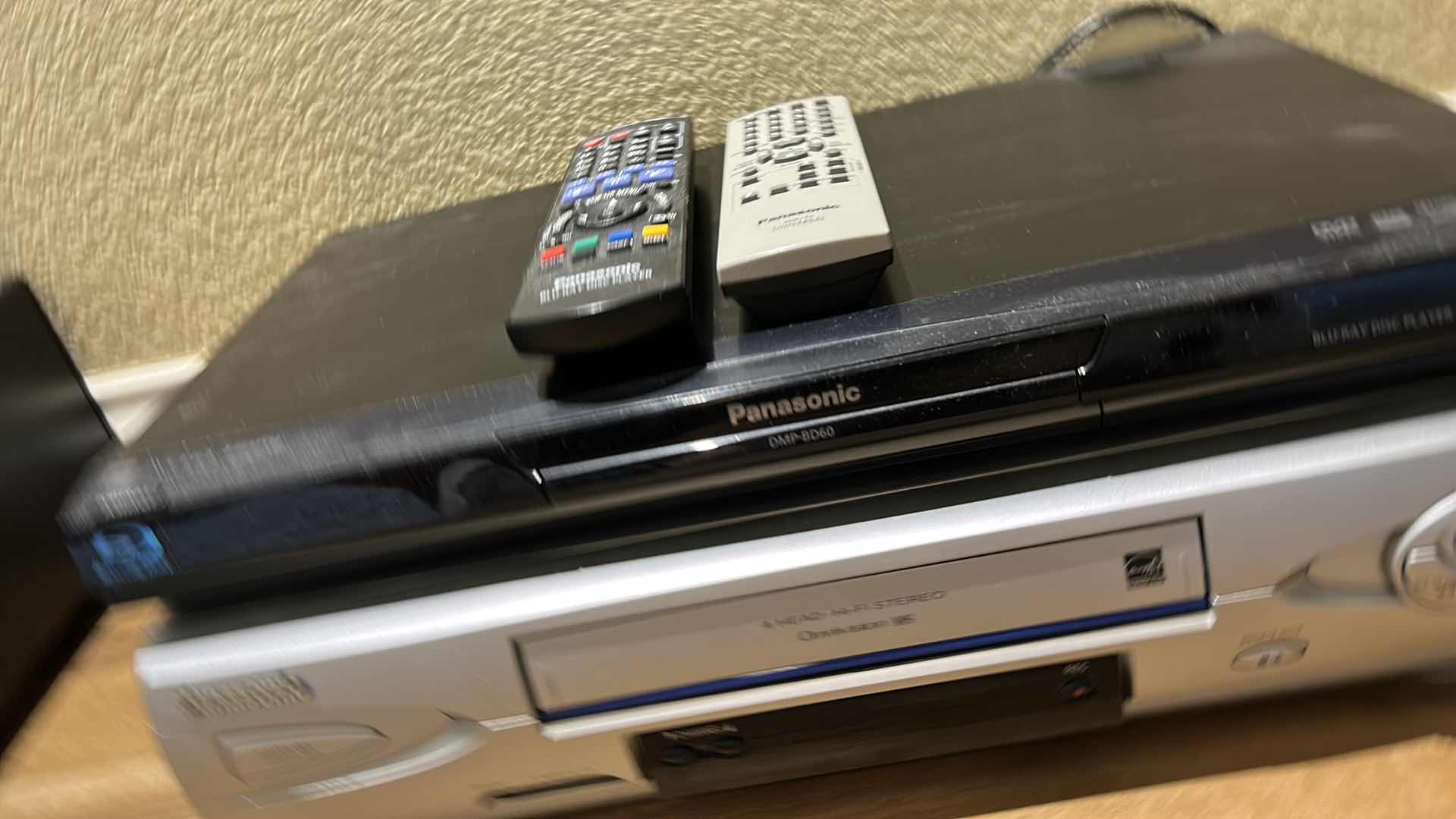 Photo 1 of 2 PANASONIC ELECTRONICS - BLU-RAY DISC PLAYER & VHS PLAYER W REMOTES