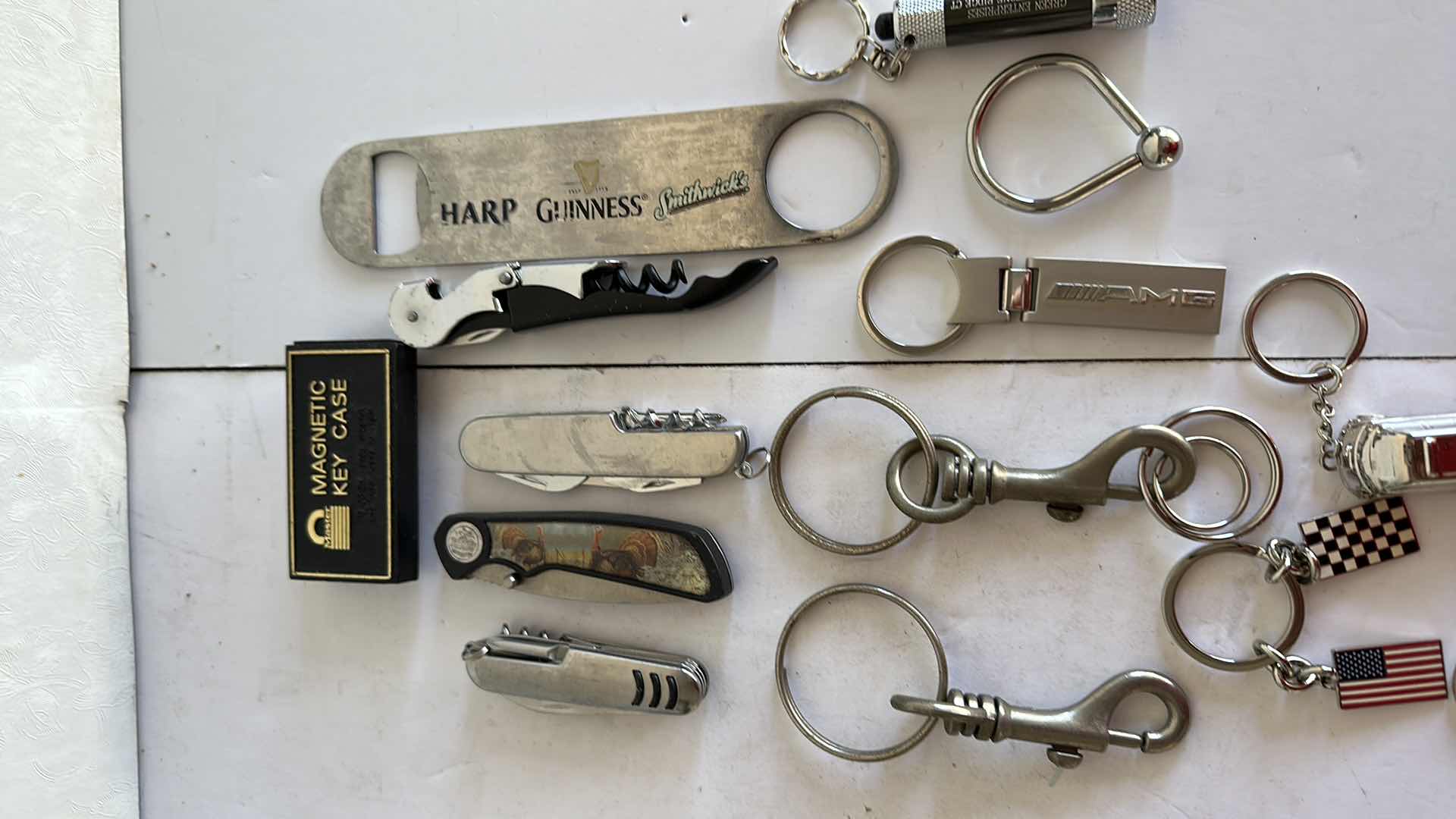 Photo 1 of POCKET KNIFES AND KEY CHAINS