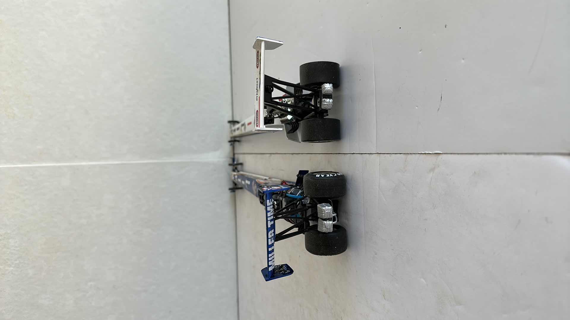 Photo 1 of TWO MILLER LITE DRAGSTERS 16”