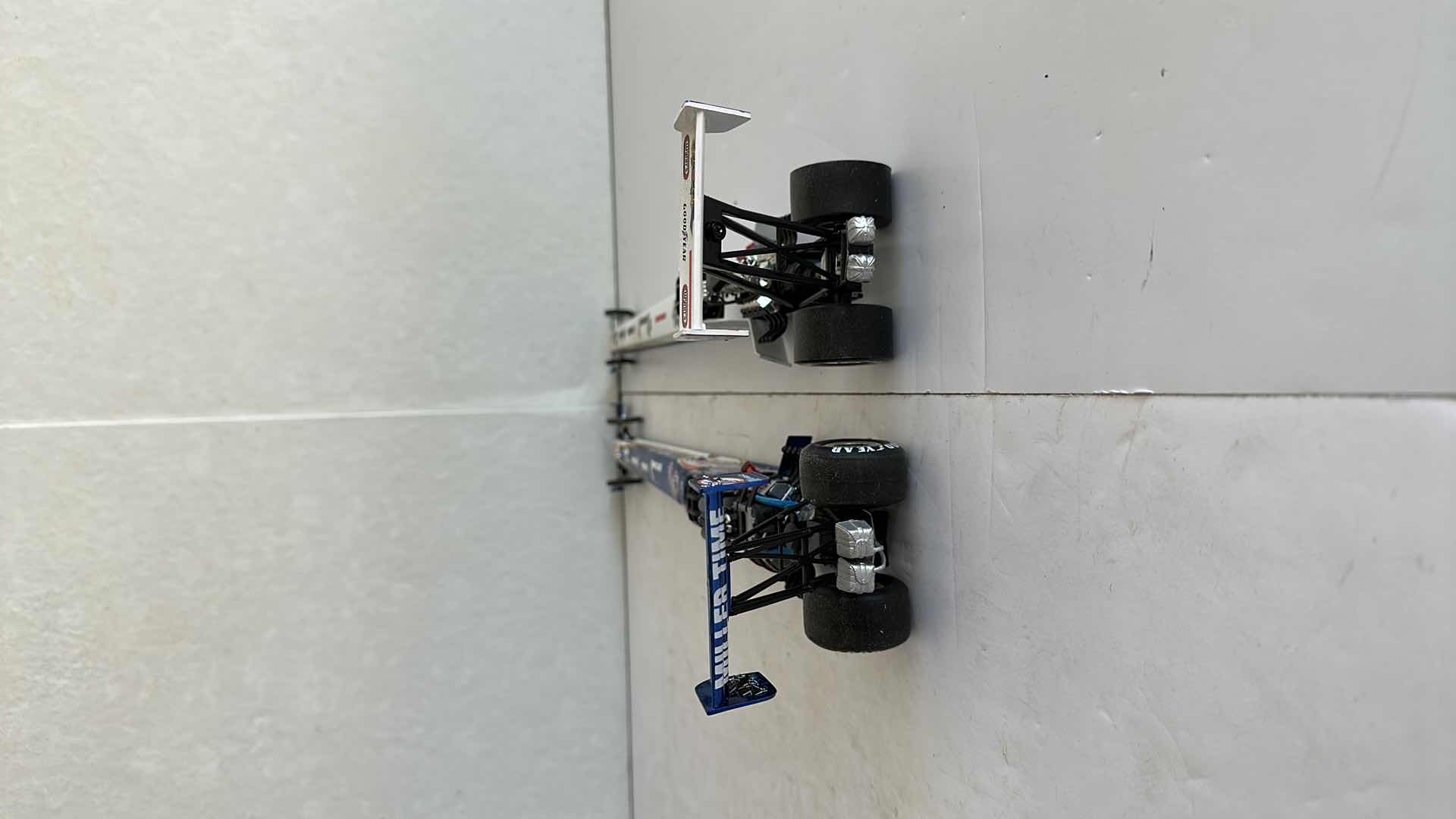 Photo 1 of TWO MILLER LITE DRAGSTERS 16”