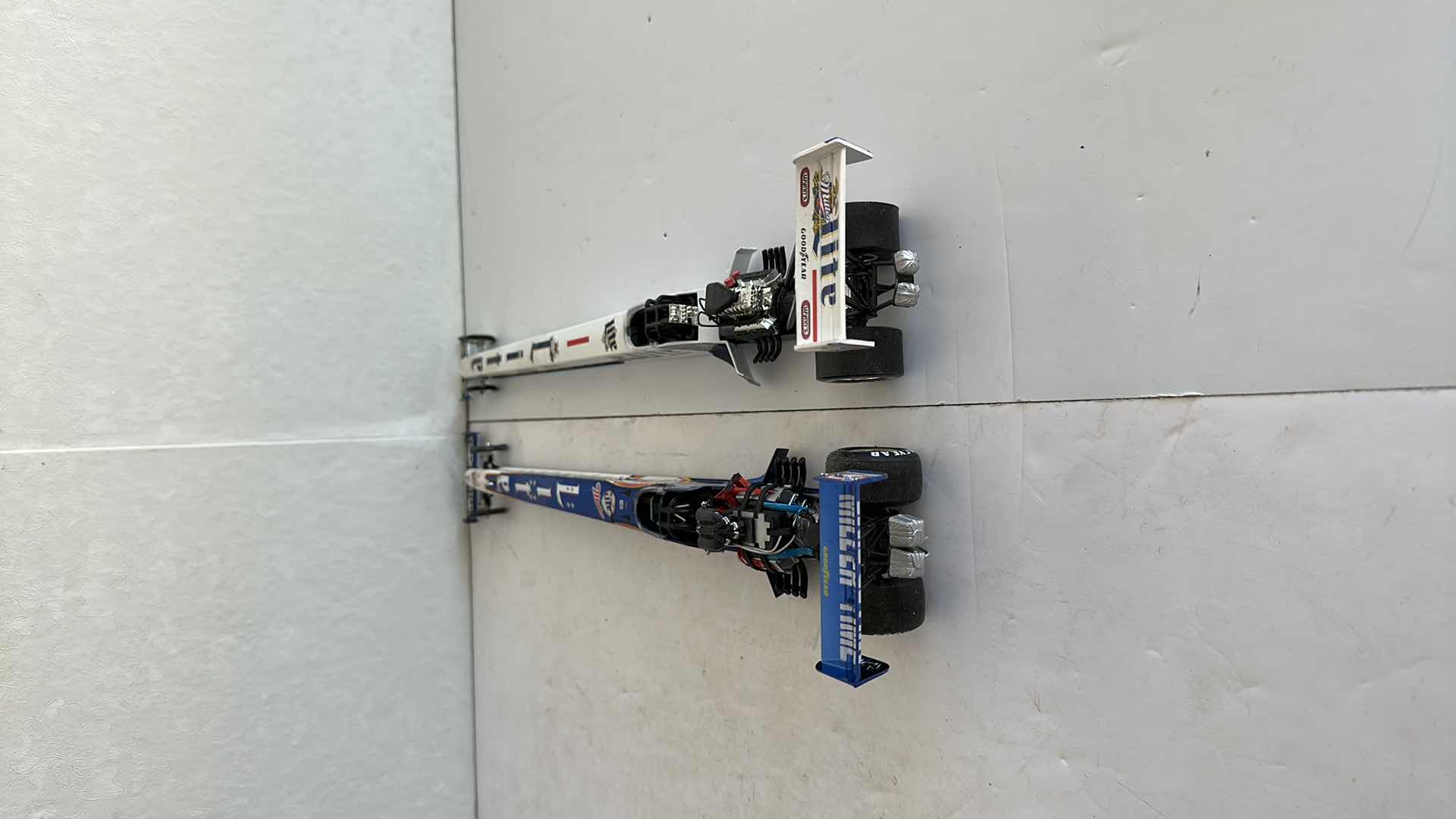 Photo 1 of TWO MILLER LITE DRAGSTERS 16”