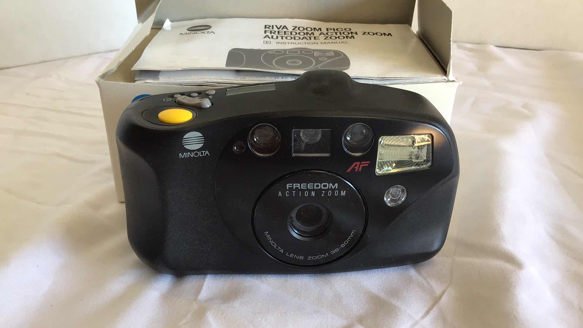 Photo 1 of NEW MINOLTA FREEDOM ACTION ZOOM 35MM CAMERA