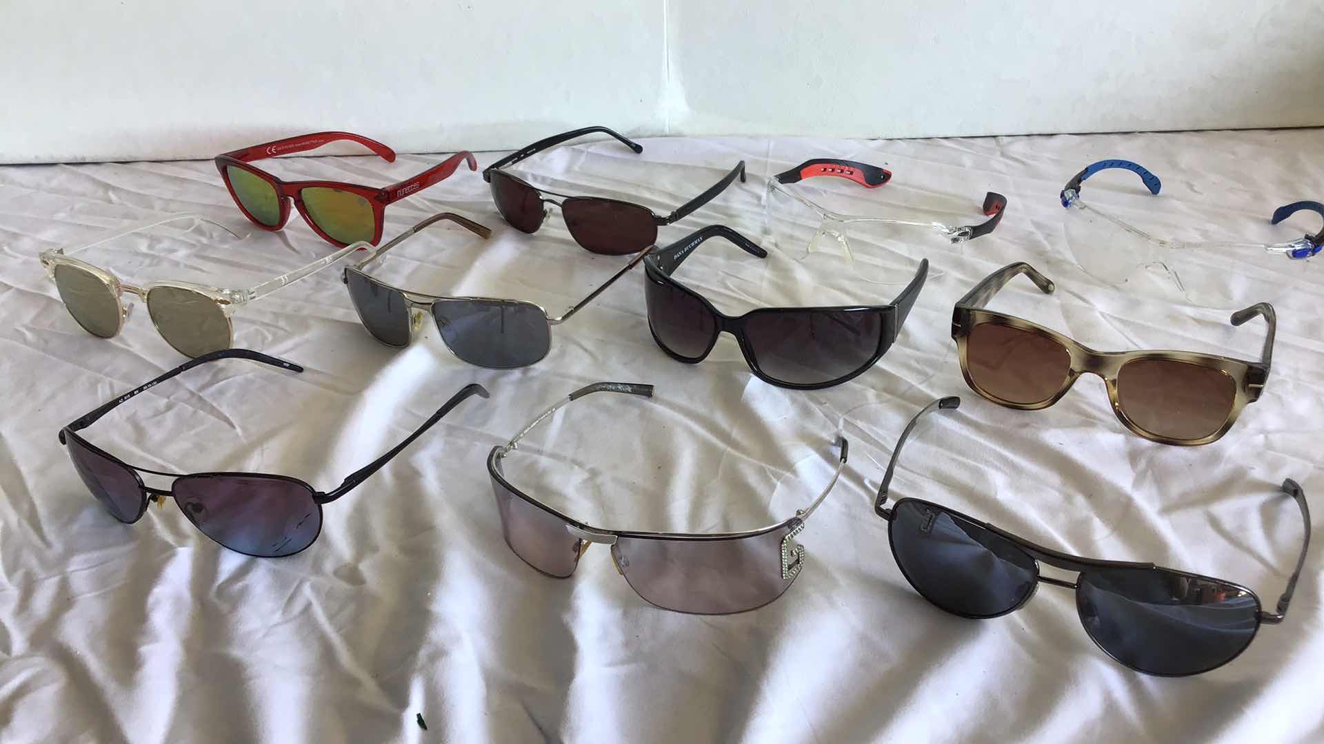 Photo 1 of ASSORTMENT OF 11 PAIRS OF SUNGLASSES (DOLCE&GABBANA, 3M, AZTEC, ETC.)
