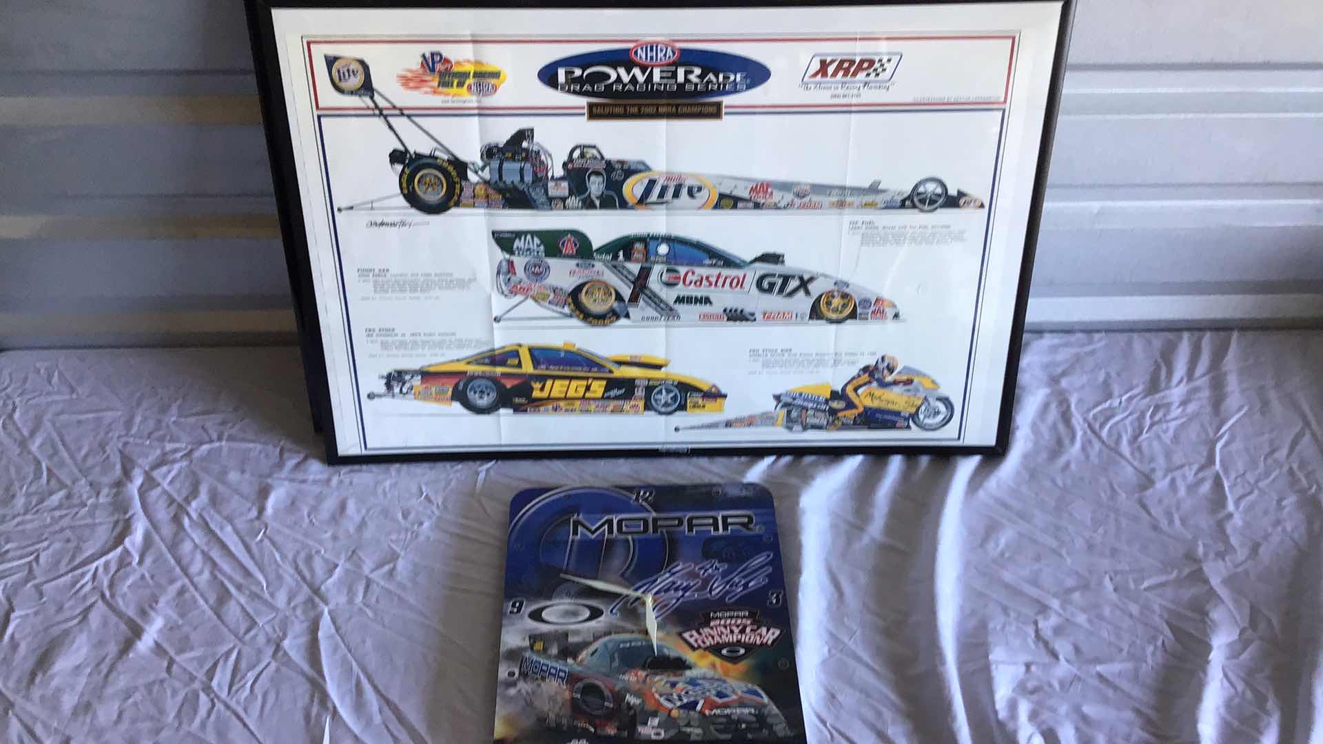 Photo 1 of MOPAR WALL CLOCK & 5 NHRA/NASCAR FRAMED POSTERS 31” X 21”