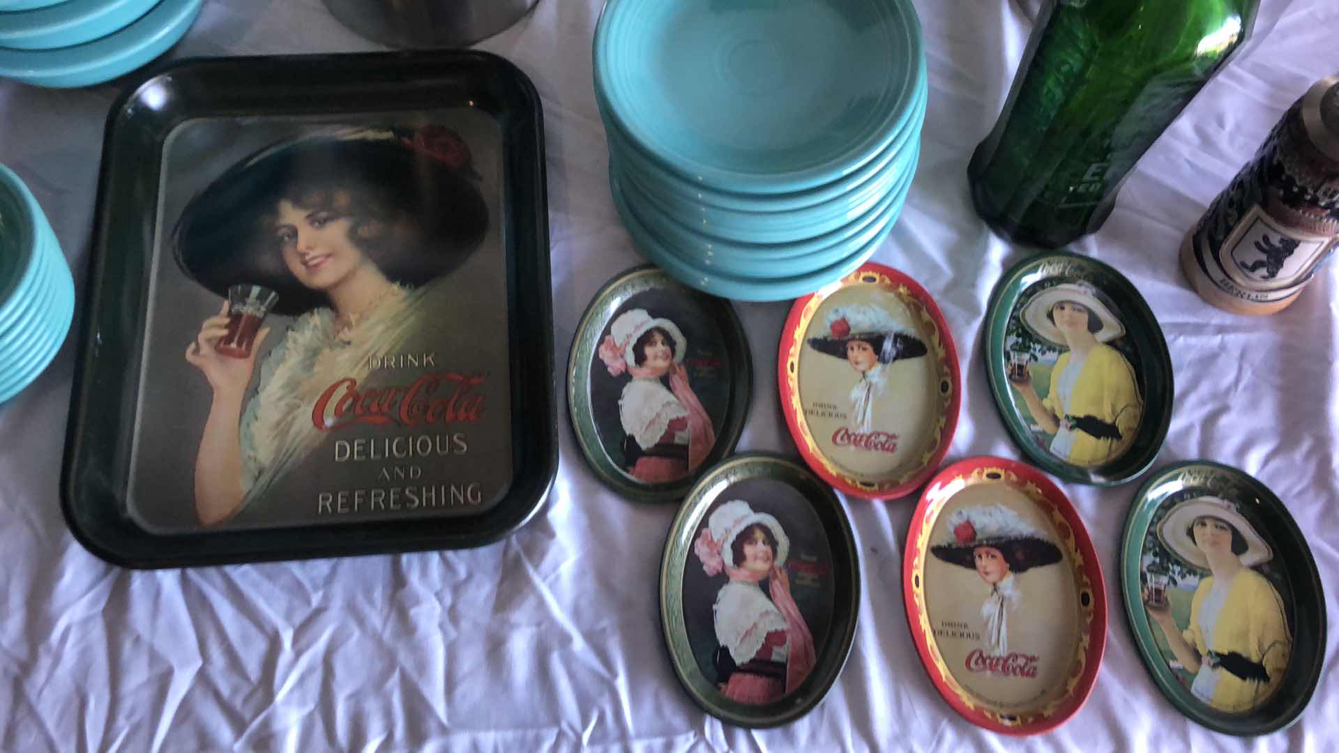 Photo 1 of KITCHEN ASSORTMENT - COLLECTIBLE COCA COLA SELTZER BOTTLE AND PLATES, METAL VESSELS, 14 PLATES AND 12 BOWLS