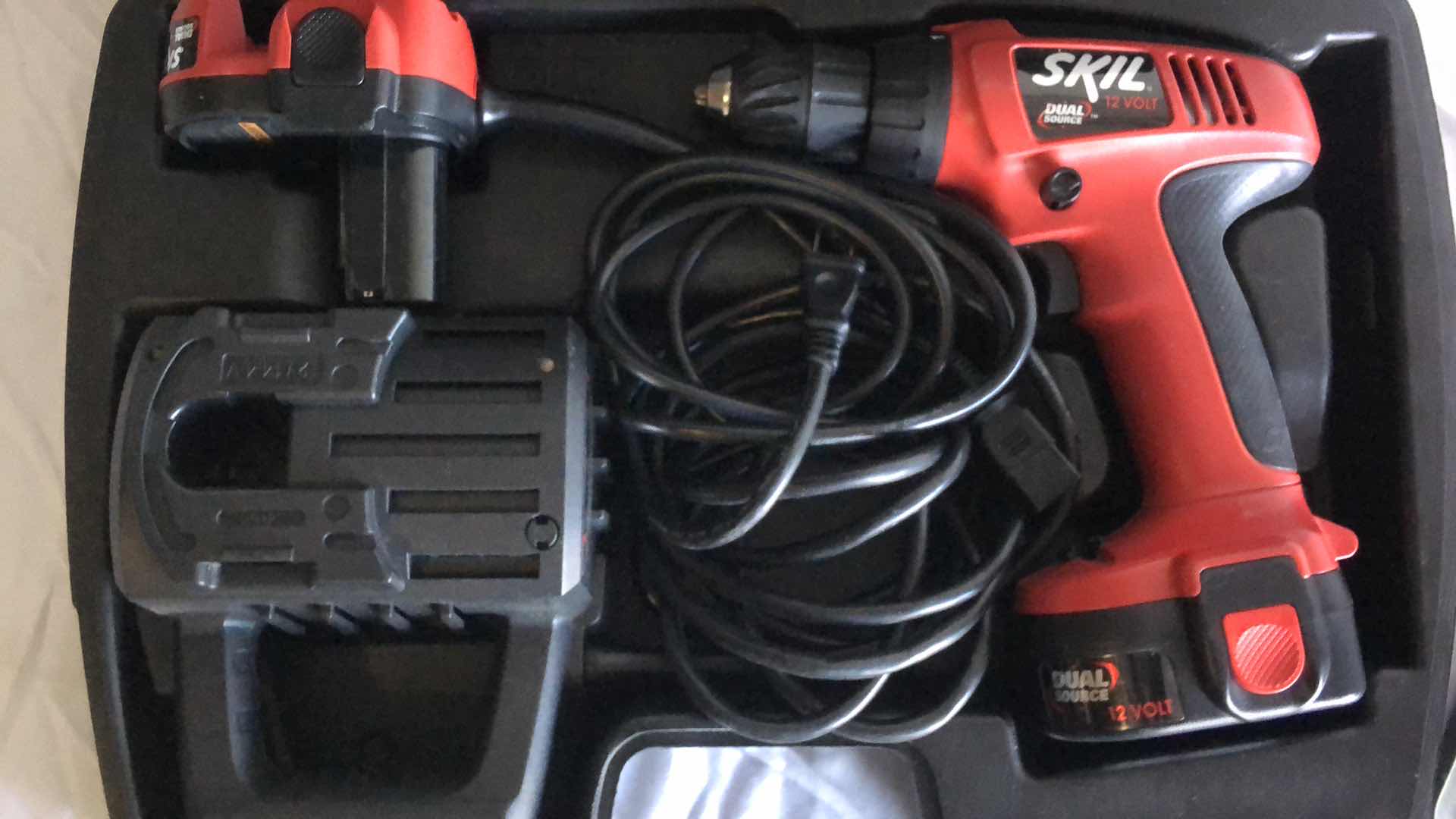 Photo 1 of SKIL CORDLESS DRILL AND 88pc DRILL BIT SET, COLLECTIBLE GOLF BALL DISPLAY