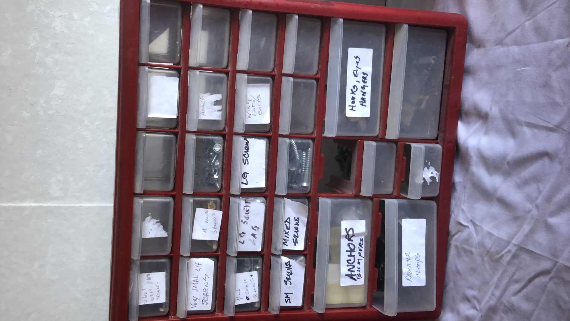 Photo 1 of SORENSEN MAGNITION IGNITION TESTER, LARGE ASSORTMENT OF SCREWS, NUTS, BOLTS, BUNDLE OF STEEL CABLE