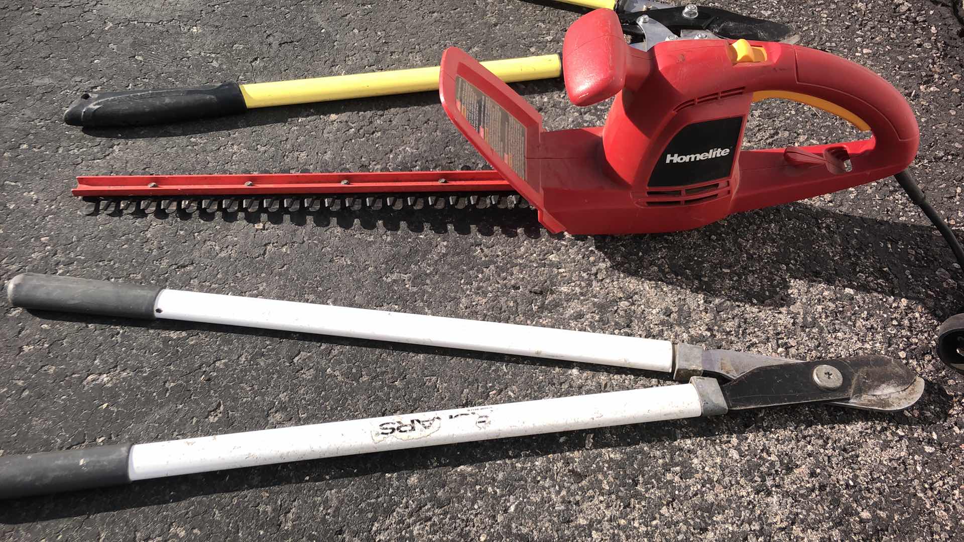 Photo 1 of ELECTRIC HEDGE TRIMMER AND 2 PRUNING SHEARS
