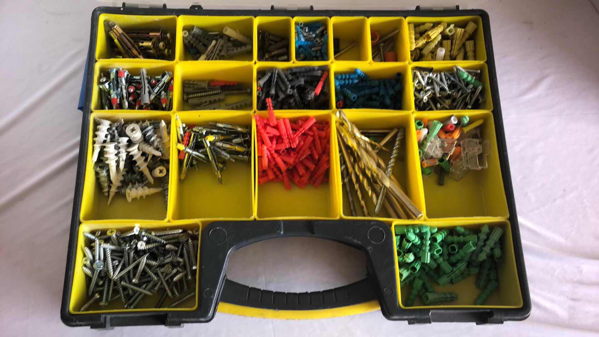 Photo 1 of VOYAGER 17” STEEL TOOLBOX W CRIMPING TOOLS AND STOREHOUSE STORAGE BIN FULL OF WALL ANCHORS