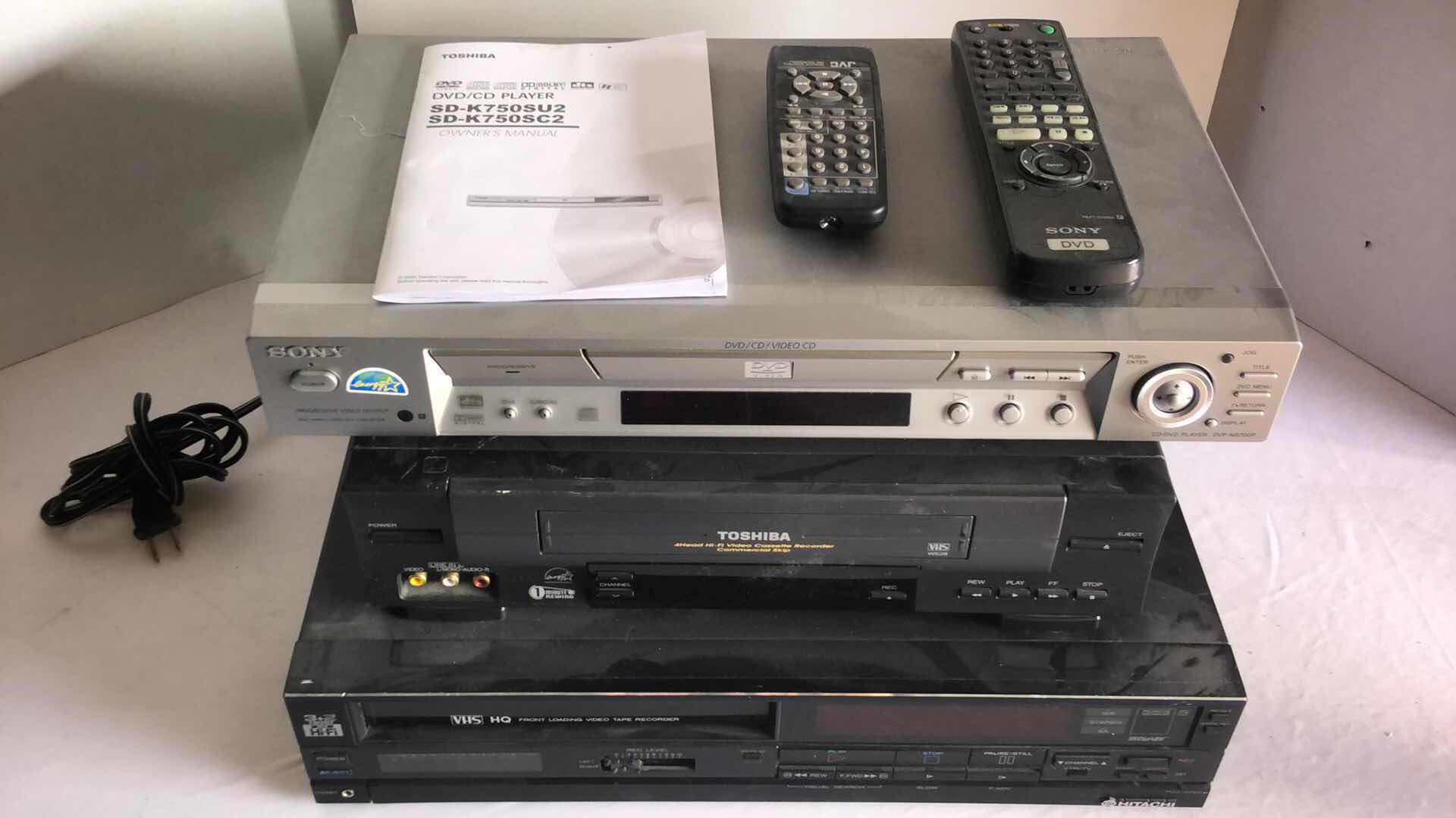 Photo 1 of SONY DVD CD VIDEO PLAYER, TOSHIBA 4 HEAD HIFI VHS PLAYER AND HITACHI 3+2 HEAD HIFI VHS PLAYER W REMOTES (3)