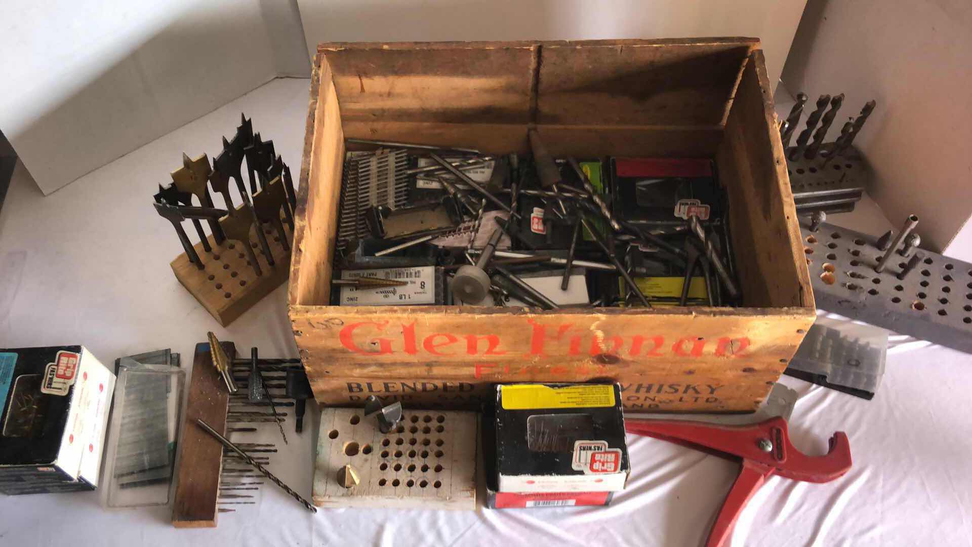 Photo 1 of BIS CRATE FULL OF ASSORTED DRILL BITS, TOOLS, NAILS