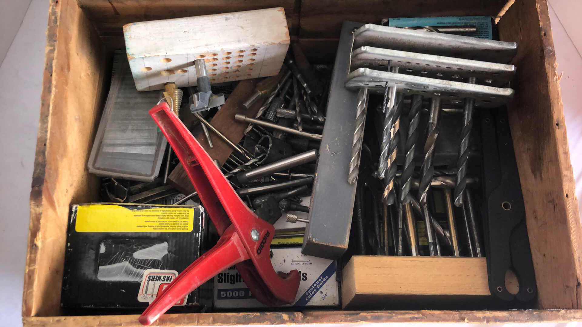 Photo 1 of BIS CRATE FULL OF ASSORTED DRILL BITS, TOOLS, NAILS