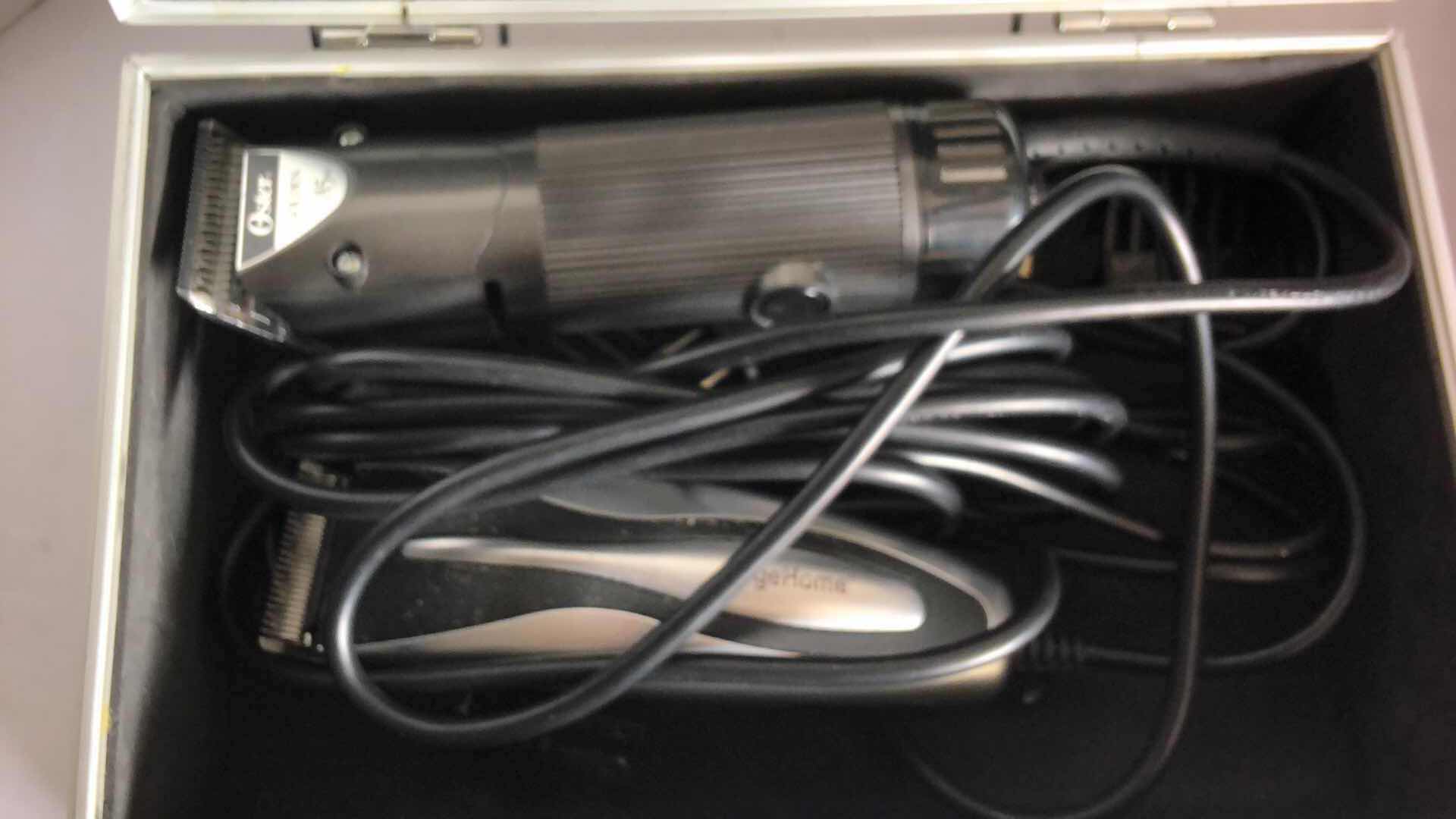 Photo 1 of BOXES WITH 4 ASSORTED PROFESSIONAL HAIR CLIPPERS W BRUSHES AND GREASE