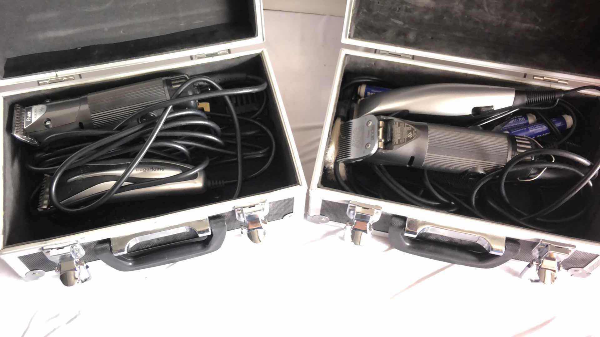 Photo 2 of BOXES WITH 4 ASSORTED PROFESSIONAL HAIR CLIPPERS W BRUSHES AND GREASE