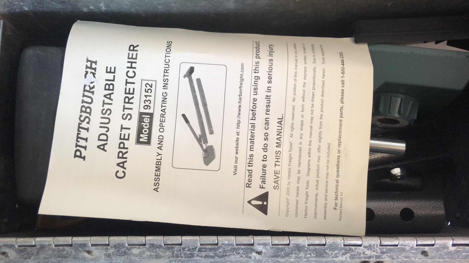 Photo 1 of LARGE METAL TOOL BOX WITH ASSORTED TOOLS AND PITTSBURGH ELECTRIC CARPET STRETCHER