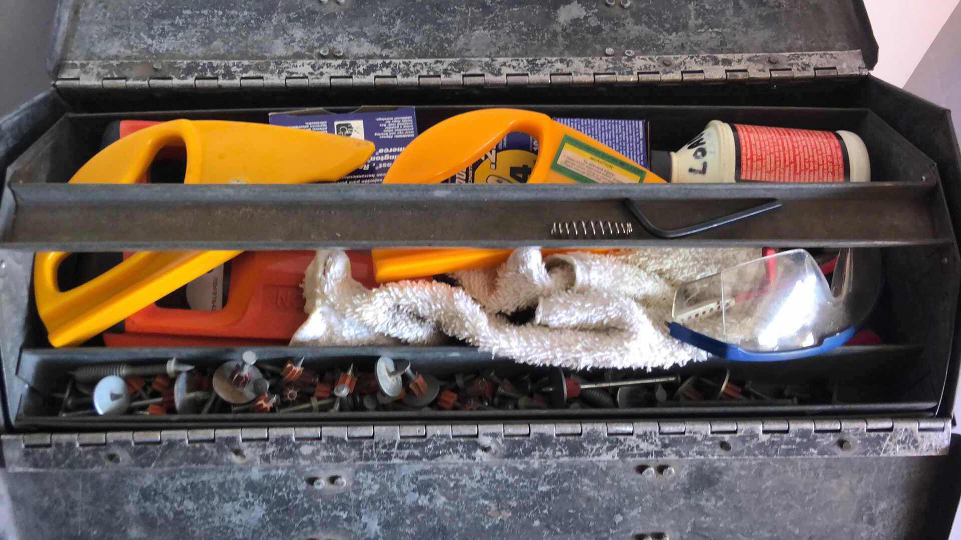 Photo 1 of LARGE METAL TOOL BOX WITH ASSORTED TOOLS AND PITTSBURGH ELECTRIC CARPET STRETCHER