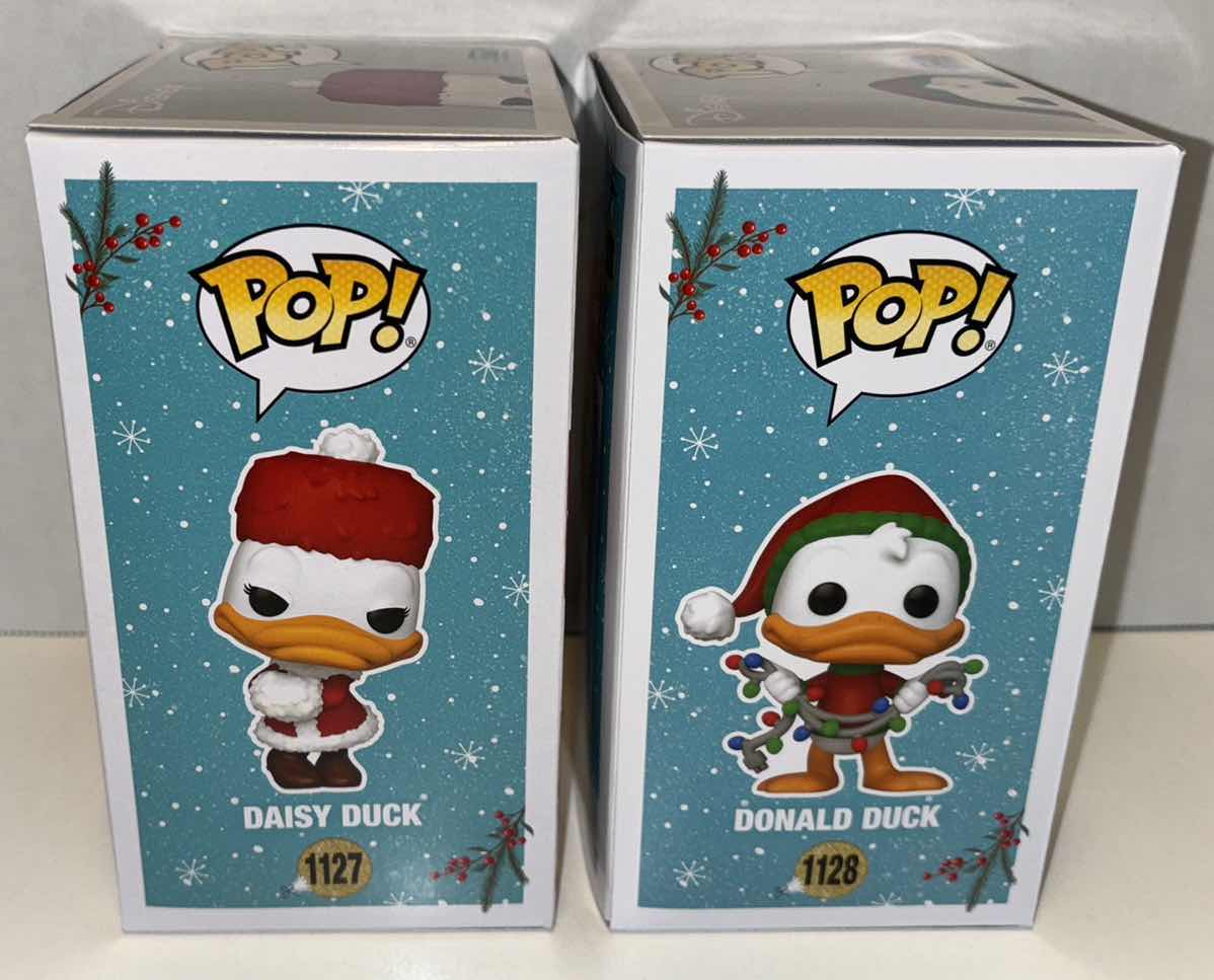 Photo 1 of NEW FUNKO POP! 2021 DISNEY HOLIDAY VINYL FIGURE 2-PACK, #1127 DAISY DUCK & #1128 DONALD DUCK